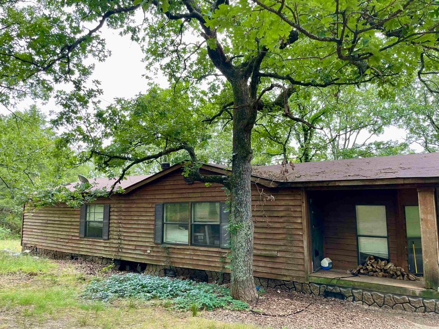 Great opportunity to make this spacious mobile home your new project and add your own personal design. 3 bedrooms and 2 fully bathes. Fireplace with built ins. Enjoy entertaining in a large open kitchen/dinning area.  Relax on your porch and watch the deer. Storm cellar. All of this and just minute's from Vilonia and quick access to Conway shopping, schools, hospitals and dining.  Sold AS IS. Call today and schedule your private showing.