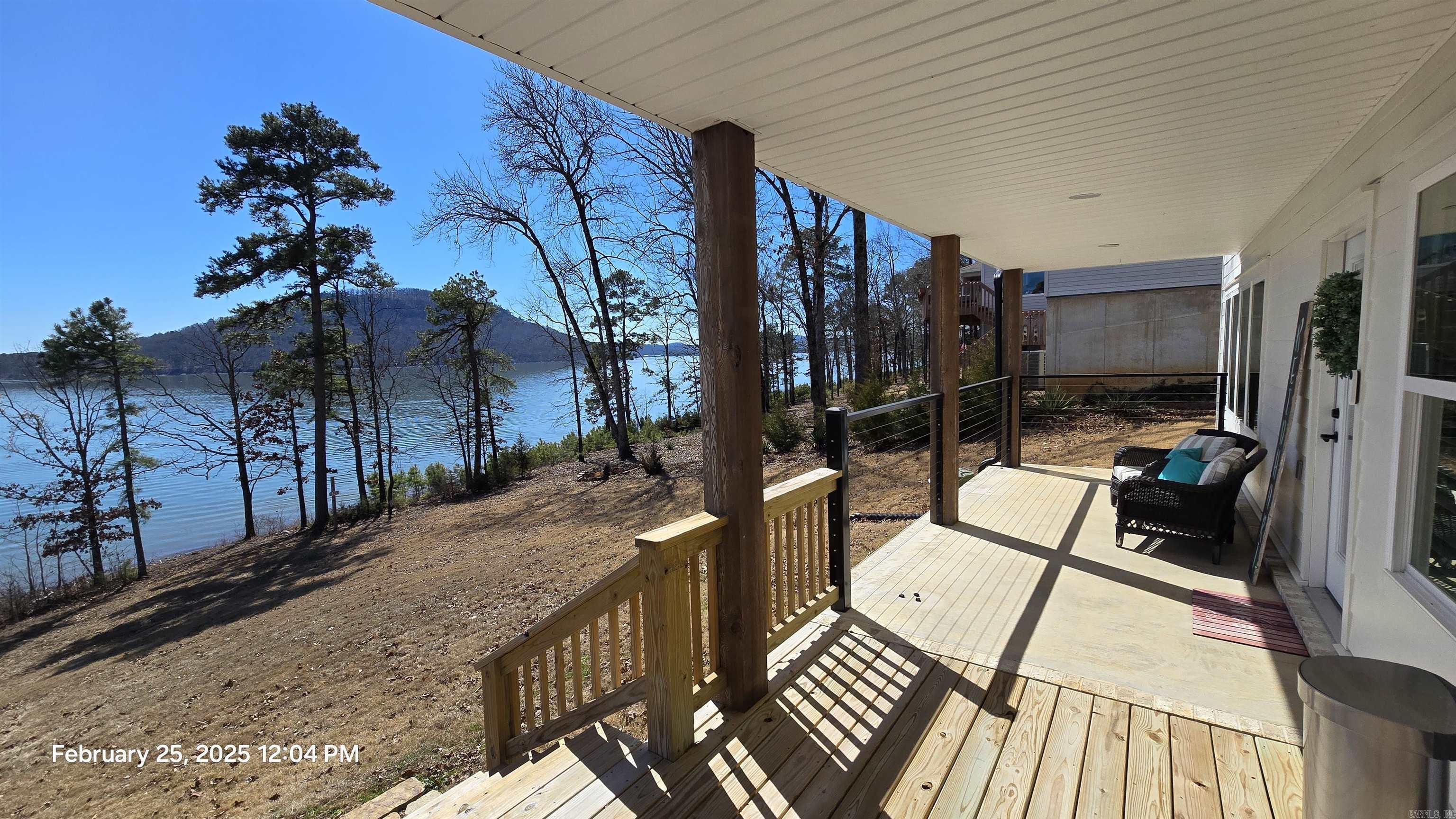 Imagine waking up to breathtaking 180-degree views of the crystal-clear waters of Greers Ferry Lake, right from your brand-new 3,300 sq ft lakefront home! This stunning, newly constructed retreat blends modern comfort with serene natural beauty, offering the ultimate escape in the heart of a vibrant resort town. Available partially furnished for your convenience, this spacious home is move-in ready and designed to impress. Picture yourself relaxing on your private deck, soaking in panoramic lake views, or entertaining friends in a space that’s as functional as it is luxurious. It’s the perfect blend of laid-back lakeside living and resort-style amenities. Nestled in Fairfield Bay, you’ll enjoy endless fun just steps from your door: two championship golf courses, a marina for boating adventures, bowling lanes, mini golf, and an RV campground for visiting guests. Craving a bite? Savor delicious pizza from multiple local spots or dive into mouthwatering Mexican cuisine—Fairfield Bay has it all! Don’t miss your chance to own this slice of paradise. Contact us today to make this dream home yours and start living the lakefront life you deserve!