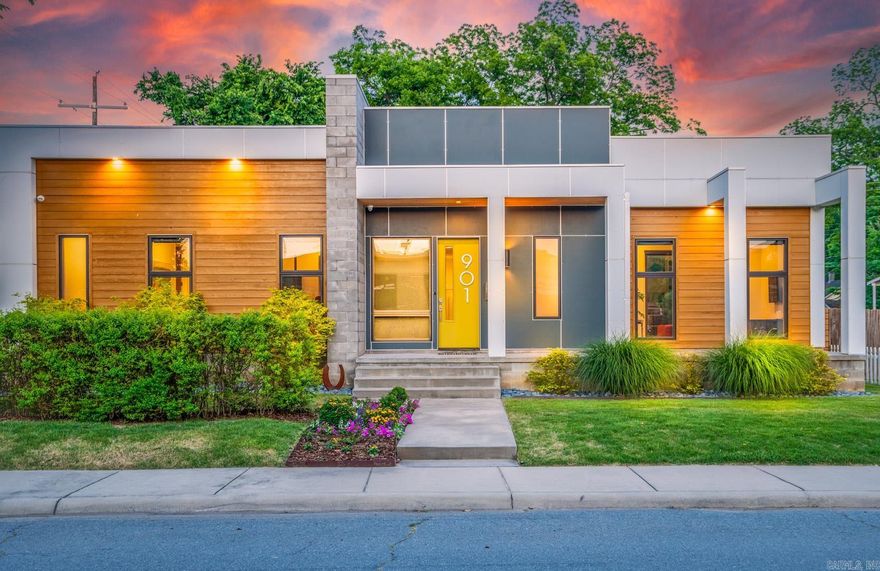 Welcome to contemporary urban living in the heart of downtown Little Rock! This 3 bed,3 bath home boasts 3 suites, each with their own private bath for ultimate privacy and comfort. Step into the great room, where a fireplace, sleek concrete floors, and custom glass wine storage set the tone for elegant entertaining. The kitchen is centered around a large kitchen island and is equipped with top-of-the-line appliances, including a professional gas cooktop. Experience indoor-outdoor living at its best with a covered terrace featuring a retractable glass wall, an outdoor fireplace, and a heated saltwater pool, perfect for year-round enjoyment.The primary suite is a retreat unto itself, featuring a large soaking tub and separate shower. This smart home is outfitted with modern amenities, including a sound system, programmable Lutron lighting, and a security system. Plus, with solar panels and a Tesla Powerwall battery backup, along with two Tesla car charging stations, you can enjoy both energy efficiency and eco-conscious living. Conveniently located within walking distance to SOMA,Main Street,The River Market, and AMFA, this modern masterpiece offers the best of downtown living!