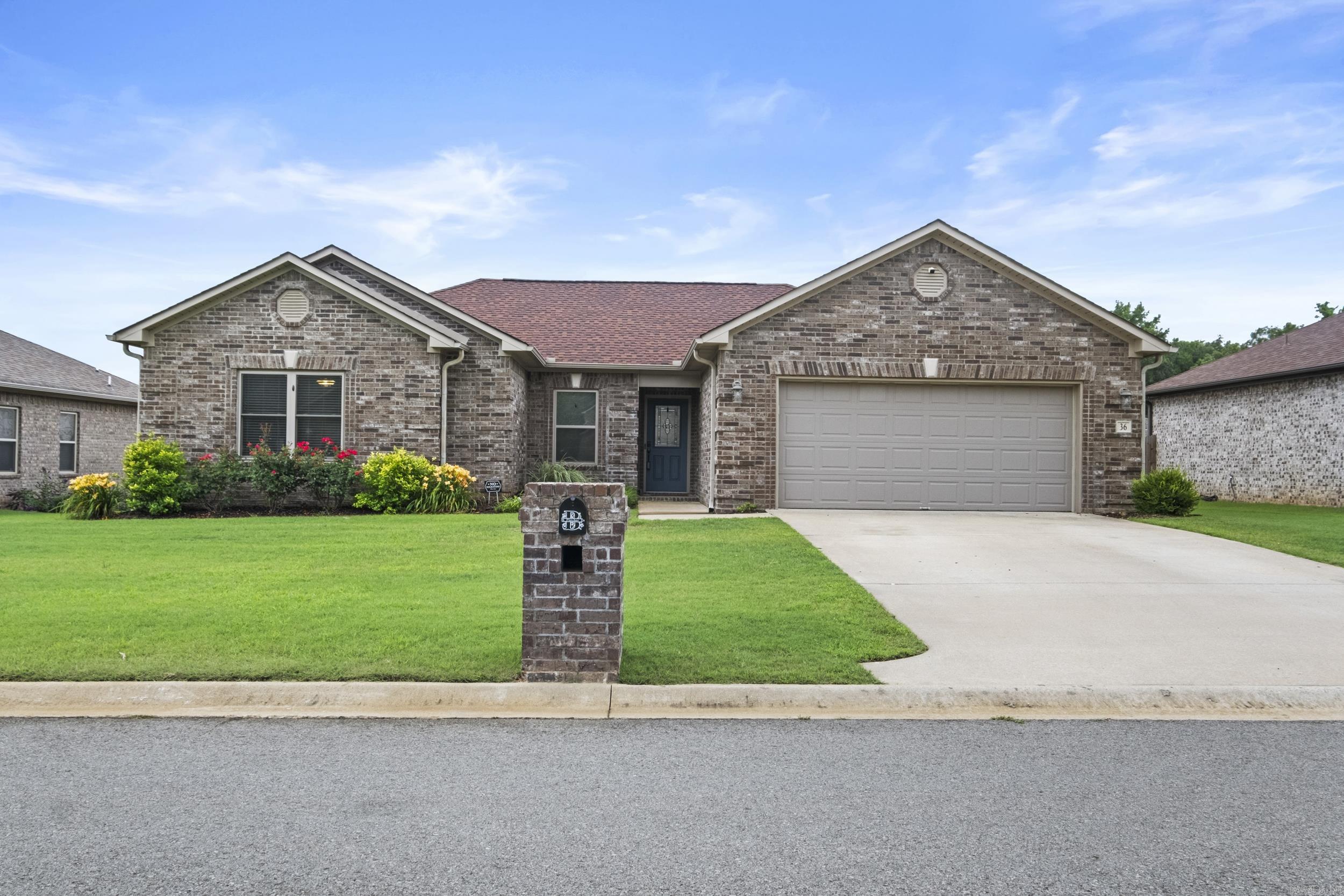 Welcome to this beautifully maintained 4-bedroom, 2-bathroom home that combines comfort, style, & functionality. Featuring an open floor plan perfect for entertaining, this home boasts a spacious living room with built-in surround sound, ideal for movie nights or gatherings. The kitchen has a pantry, stainless steel appliances, cabinet lighting, ample cabinet space, & granite countertops. The primary bedroom offers added privacy with a split-bedroom layout & includes a generous en-suite bath: with a separate shower & bathtub, double sink vanity, & large walk-in closet with built-in shelving. Enjoy peace of mind with a new roof installed in 2022. Step outside to a large covered patio perfect for relaxing or hosting guests. The 12 x 16 storage building in the backyard adds a valuable space for tools, hobbies, or extra storage. This home is move-in ready and in very good condition!