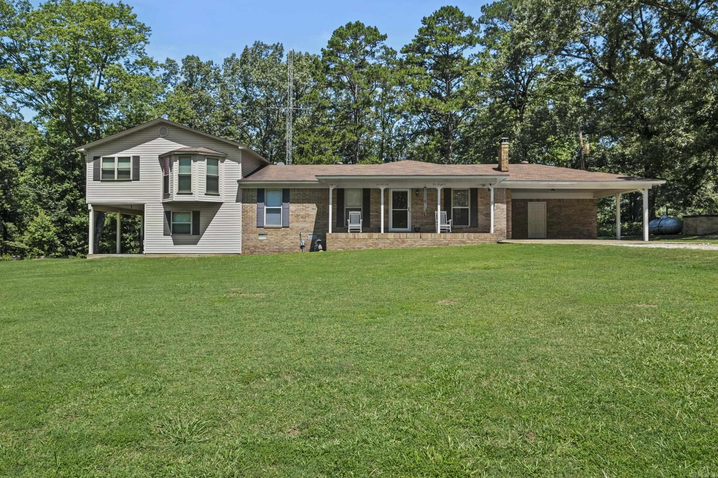 THIS IS THE ONE! The best country living with easy access to the things you need. A total dream come true on +/-2 acres. Itās near shopping, and quick access to Interstate 30. Perfect location for anyone who works in Malvern, Saline County or near Hot Springs. This house is absolutely fabulous! The features go on and on! 4 bedrooms, 3 bathrooms, 2 bonus rooms. Gorgeous hardwood floors. Large living area with a fireplace insert. Open kitchen has an infrared stove, double-oven, microwave, dishwasher, and disposal. So much storage! Large front porch, covered back patio, the add on has double-hung windows with an upstairs bonus room w/a mini-split. Laundry room. Tile in kitchen. Carpet in bedrooms. 20 x 30 shop wired for both 110 & 220. Generac generator with 500 gallon propane tank. HVAC system is brand new. New water heater. Roof replaced 2017. Electrical upgrades 2020. City water. Survey available with boundary pins visible. This home is ABSOLUTELY immaculate. Sq. ft. approx/measuring encouraged.