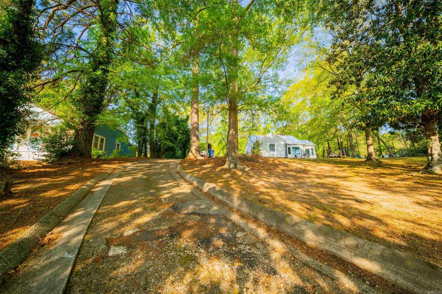 Situated on over 1 acre in the heart of town, this 2 bedroom, 2 bath property offers space, flexibility, and opportunity. Inside you’ll find a dining room, laundry area, and pantry, plus a bright sunroom that could easily serve as a home office or guest room. With plenty of yard space to enjoy, this property is priced with improvements in mind, allowing you to move in comfortably while making updates at your own pace.