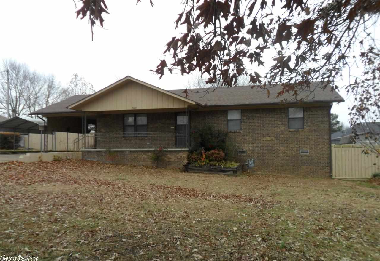 This home and property has a lot to offer with nice level lot, with only gentle slop to street, a fenced back yard for privacy, 2 nice storage buildings, a very pretty view of the mountains. This a lovely brick home with low maintenance, 3 bedrooms, 2 baths, CH&A, paved drive to spacious carport, and very nice screened in back porch. . All this at a very affordable price. A must see to appreciate.