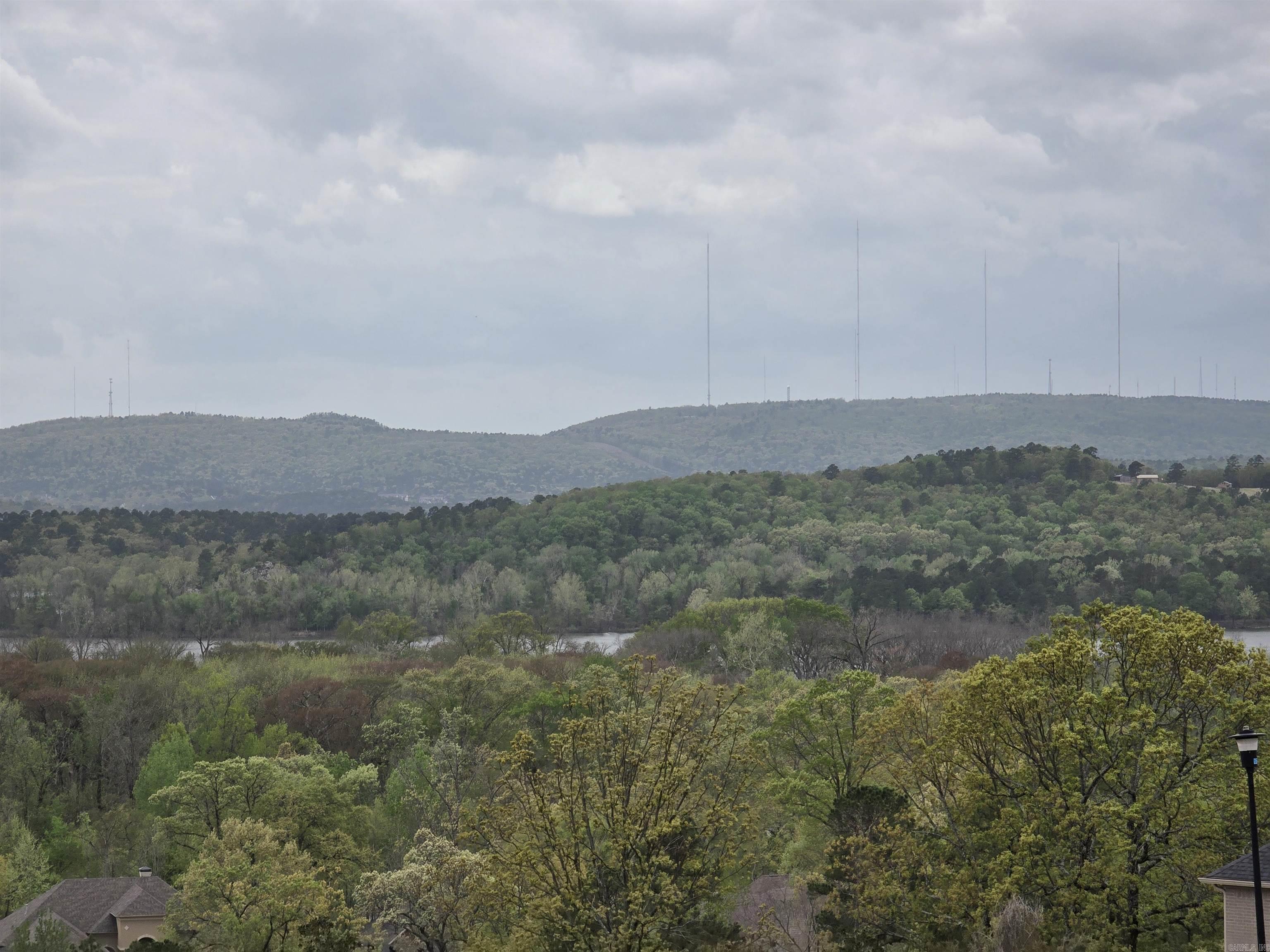 MOTIVATED SELLER! Half acre cul-de-sac lot in desirable Osage Falls neighborhood in 2025? This lot is ready to accommodate your home plan in a neighborhood that has views of Pinnacle Mountain & the Arkansas River. Utilities are street. Ready to live, work & play in the city of Maumelle that boast a public library, schools, restaurants, lakes, walking trails, parks, pool, tennis, golf and country clubs plus recreational facilities? Look no further AND a new pickle ball court! Maumelle is convenient to downtown Little Rock & West Little Rock. Need more information? Contact our team for builder and lender recommendations. Sellers are ready to negotiate and help make your dream come true. See Agent Remarks!