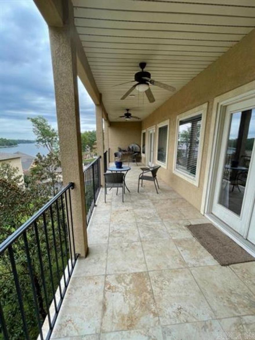 BEAUTIFUL, MOVE IN READY GATED LAKE HAMILTON CONDO!! Enjoy relaxing on the large deck. Updated condo, elevator so no stairs when moving, ,granite countertops, stainless steel appliances and tall ceilings. nothing missing in this beautiful space. Come make this your new home!!