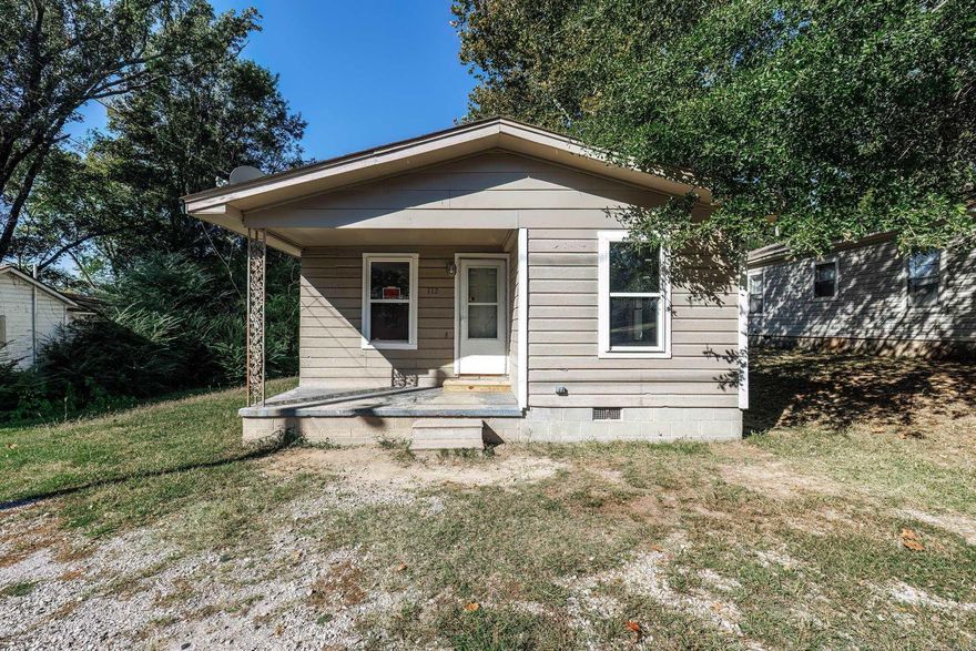 Discover this charming two-bedroom, one-bath house with a detached shop, boasting brand new vinyl flooring throughout. This property offers an exceptional investment opportunity. The recently updated flooring not only enhances the overall aesthetics but also ensures low maintenance for years to come. This cozy residence is perfect for a small family or as a rental property, providing the ideal blend of comfort and convenience. The shop adds versatility to the property, making it an excellent space for hobbies, storage, or potential income generation. Don't miss out on this great opportunity to invest in a home that combines modern upgrades with potential for growth. Your future awaits in this delightful two-bedroom house with endless possibilities.