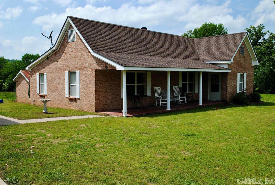 If you are looking for a great home on acreage in a convenient location, then this could be what you are looking for. Located just off a paved road is this remodeled approximately 1400 Sq.Ft. 3 bed 2 bath brick home with 850 Sq.Ft. two car detached garage. The home sits up on a hill providing nice views of the green pasture that lays very well and includes an approximately 1 ½ acre pond that is full of fish! Fenced and cross fenced with a 30x30 barn and a small working pen you could easily start a family farm. Most of the property is open but there is some mature hardwood timber that provides habitat for wildlife and deer are abundant. If you are ready to move to a home on acreage and start enjoying country life you need to check this place out.