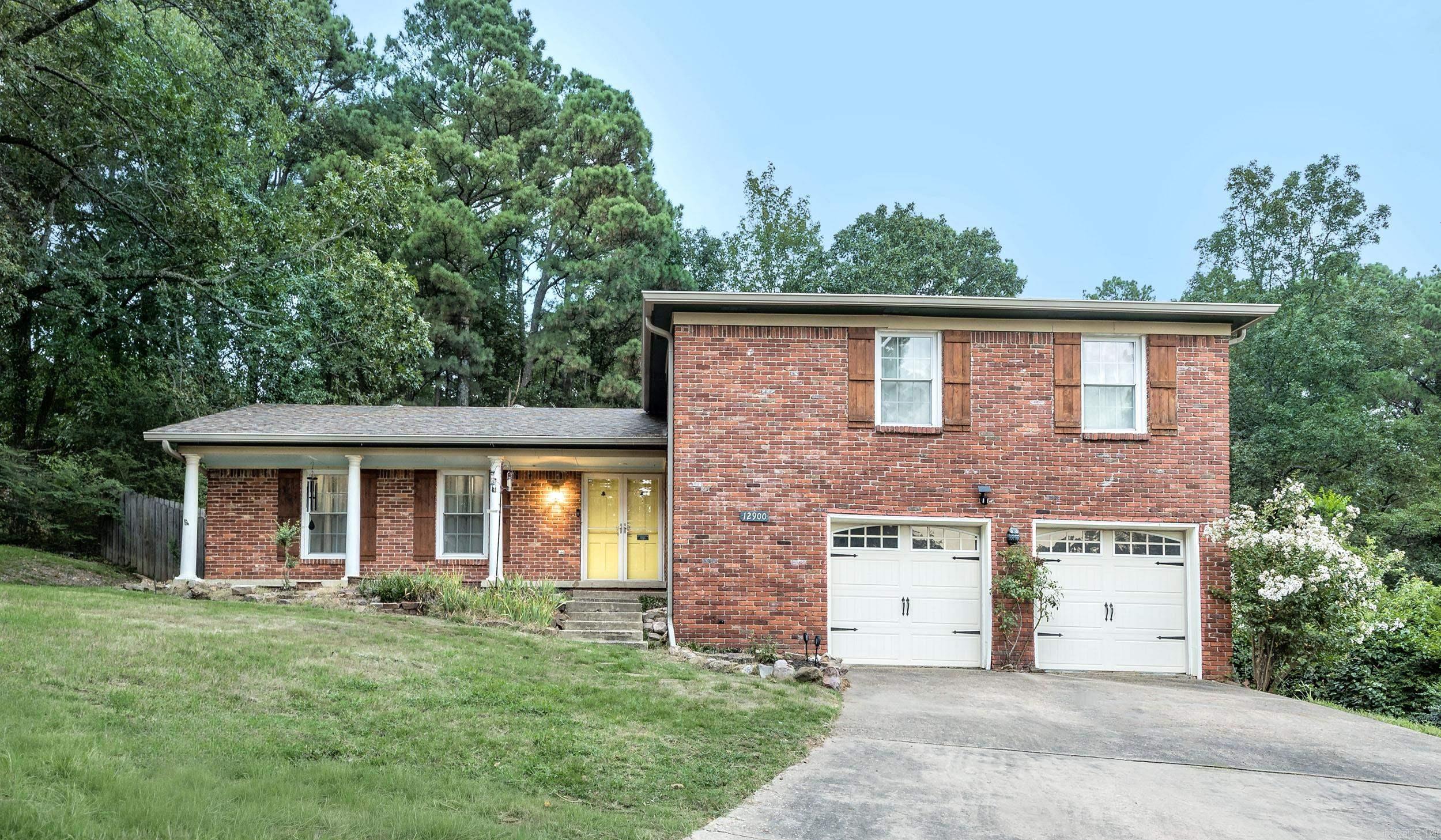 Nice Walton Heights tri-level with 4 bedrooms and 2 full baths with approximately 2291 square feet. 2 separate living areas...one on the main level and another on the lower level. Both have access to a back patio and/or deck area. 2 car garage with double doors & two separate auto door openers. Great curb appeal with an extra deep lot and driveway with plenty of parking. The kitchen has quartz countertops, stone backsplash. Updates include oven in 2021, dishwasher in 2020. Separate dining area with access to the back deck. Hot tub conveys "as is".