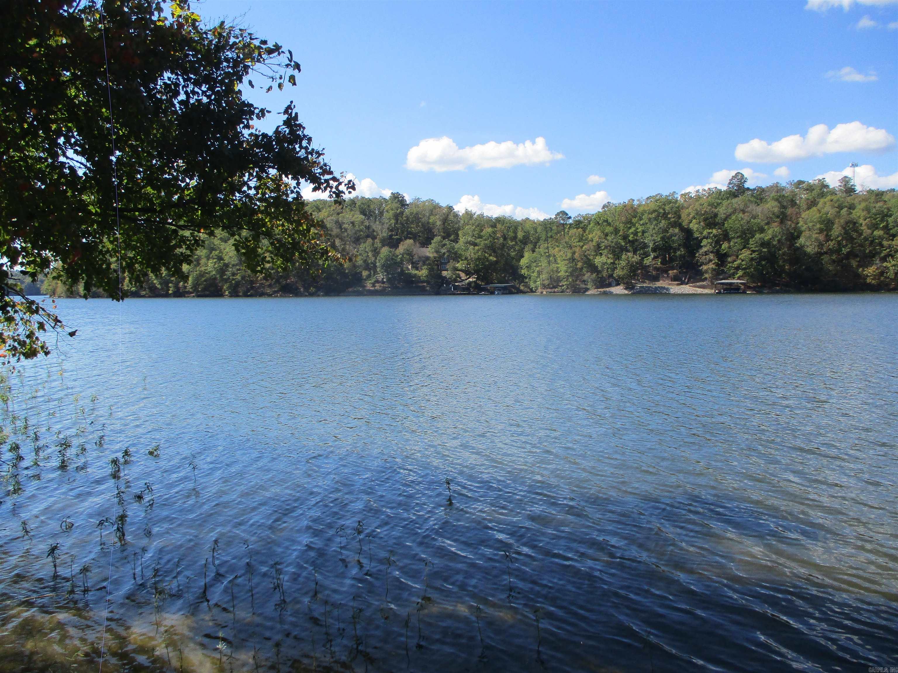 LAKE NORRELL WATER FRONT PROPERTY PERFECT FOR BUILDING NEW PRICE!!! YOUR DREAM LAKE HOME. Semi level lot with a beautiful lake view. Mobile home may not be habitable but the view of the lake is worth the price of admission. THE 0.41 ACERE LOT NEXT DOOR SI AVAILABLE BY THE SAME SELLER. DON'T MISS OUT ON THIS RARE LAKE FRONT OPPERTUNITY!!