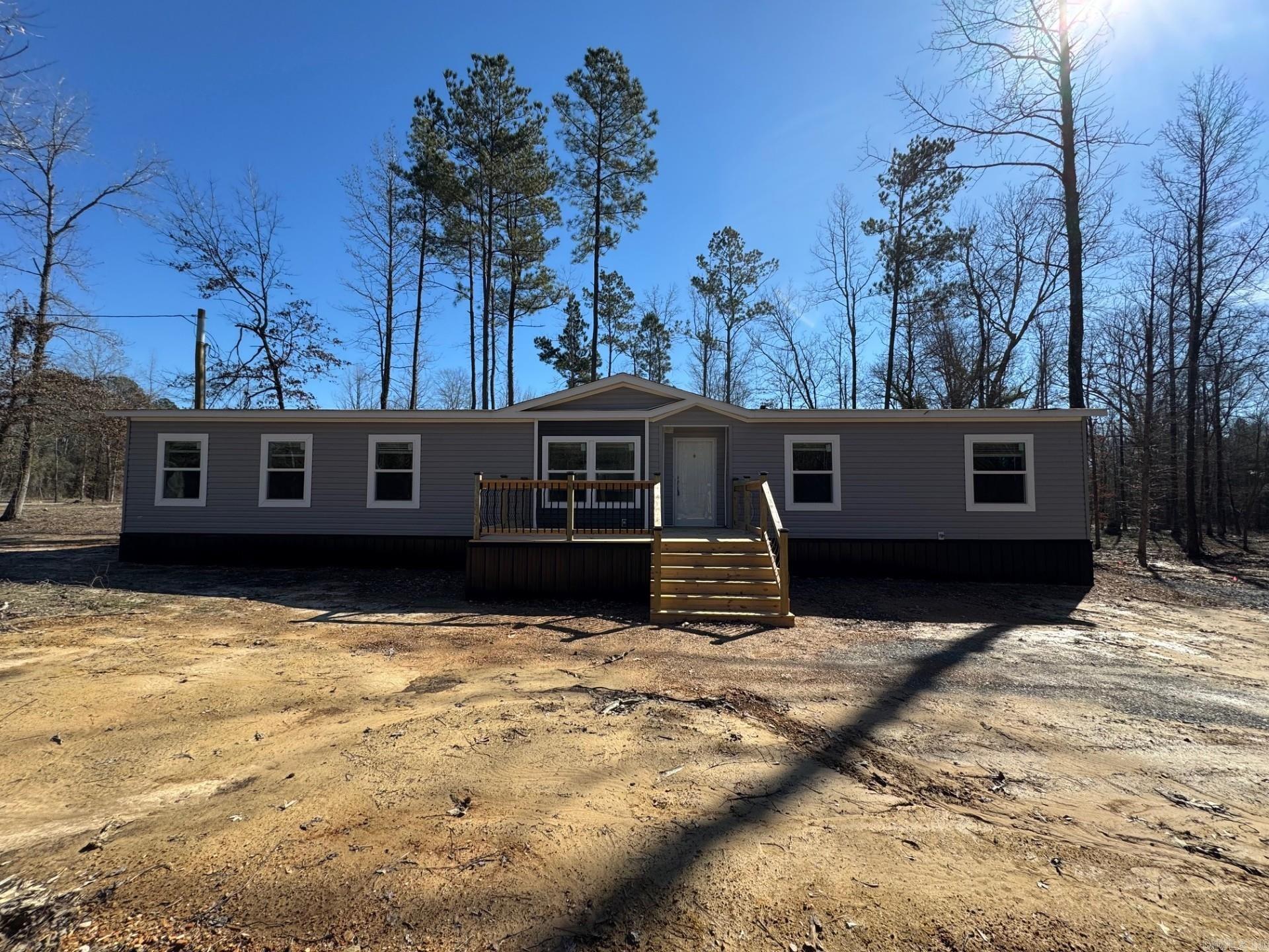 THIS HOME QUALIFIES FOR $0.00 DOWN USDA LOAN. We have lenders offering low rates and buy down points on this home. 4 bedroom 2 bath Brand new manufactured home constructed on 1.86 acres. All new appliances, new titian underpinning, new hvac, new water lines, septic, electric. front and back decks. Home is on a permanent foundation. Home is energy smart and comes with a 1 year manufactured home warranty from the dealership. All service will be taken care with the service dept at the local dealership. Be the first family to call this beautiful home yours! Listing agent can recommend lenders for a home loan. **Agents see remarks**