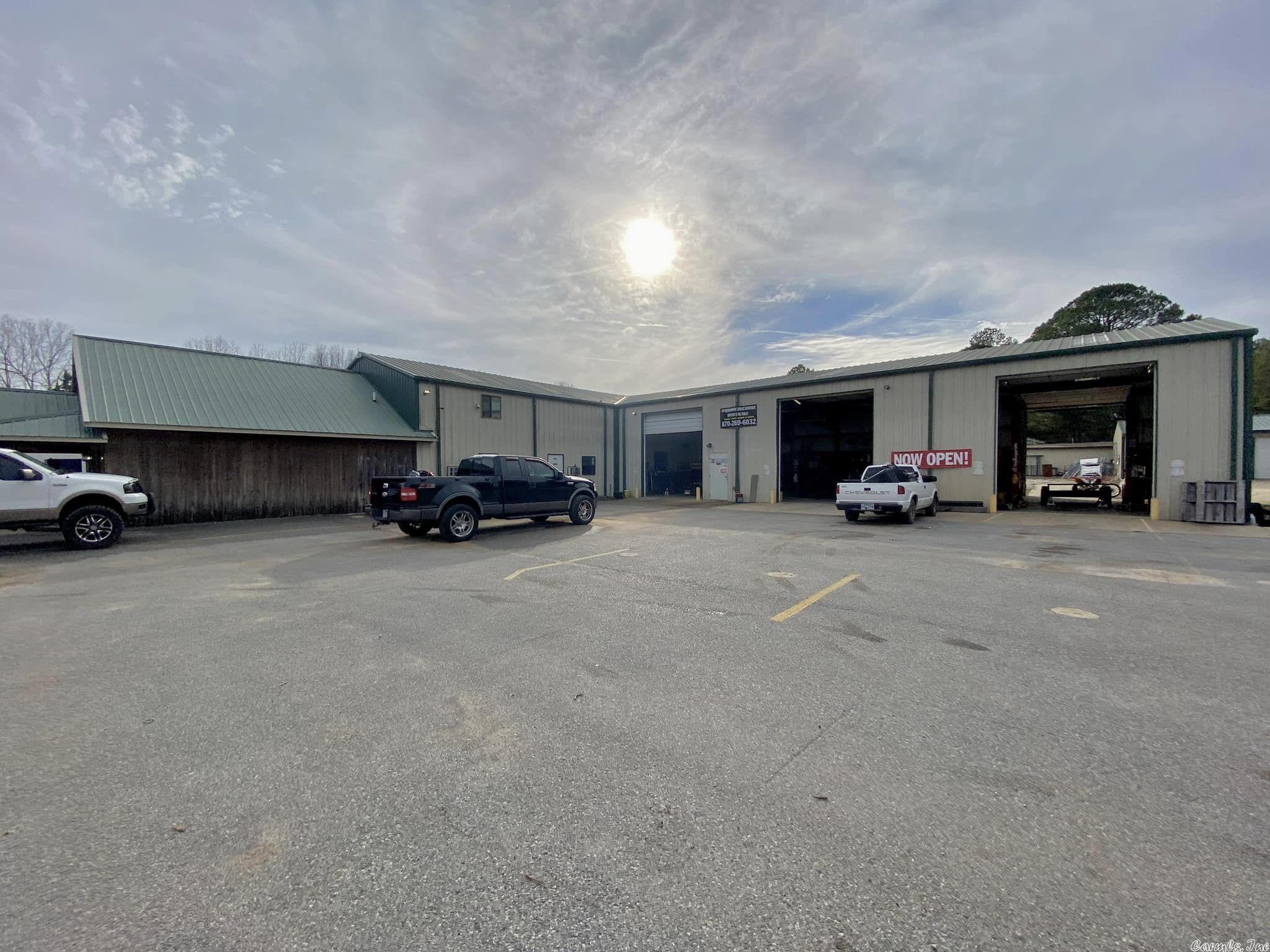 3 bay shop with 5050sf with lifts available for you to start your business in this established shop with highway frontage and a highly visible road sign. Front office/reception area for your customers to wait while you take care of their vehicles. Within 3 miles of downtown Mtn. View and approximately 1 mile from the White River. .90 acres is completely fenced with a detached 2 bay garage in the back for storage or a second work area. Shop has 2 bathrooms and plenty of upstairs storage or more office areas. Kitchen area for breaks.