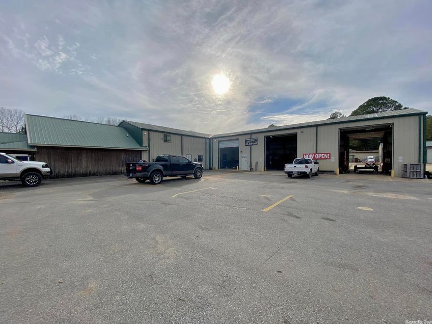 3 bay shop with 5050sf with lifts available for you to start your business in this established shop with highway frontage and a highly visible road sign. Front office/reception area for your customers to wait while you take care of their vehicles. Within 3 miles of downtown Mtn. View and approximately 1 mile from the White River.  .90 acres is completely fenced with a detached 2 bay garage in the back for storage or a second work area. Shop has 2 bathrooms and plenty of upstairs storage or more office areas. Kitchen area for breaks.