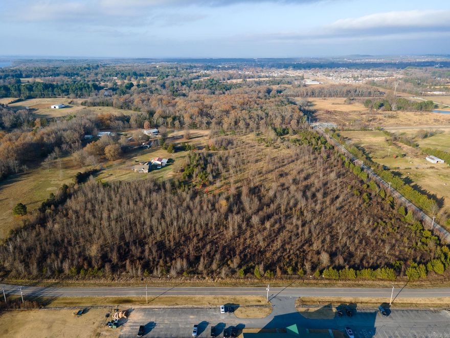 THI IS LAND ONLY ZONED 0-1 WITH ADDITIONAL USE FOR RESTURANT THIS PROPERTY IS ON THE CORNER OF ARTIST LANE AND JOHNNEY  ALLISON ROAD CONWAY CORPORATION UTILITIES ARE AVAILABLE, WATER , GARBAGE PICK-UP AND ELECTRICITY.   1,642 FEET OF PUBLIC  PAVED ROAD FRONTAGE