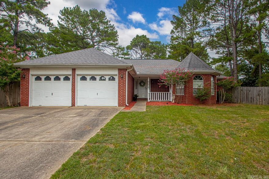 You don’t want to miss this charming all-brick 3 bed / 2 bath home nestled on a quiet cul-de-sac in an established neighborhood. Located conveniently near area walking trails, UCA, local schools, shopping, restaurants, and medical offices. New flooring was added in 2024. The well-planned layout offers room to work, dine, and relax. The spacious kitchen for features breakfast bar seating and an eat-in area perfect for casual meals, plus a separate dining room with French doors—ideal for hosting dinner, extra living space, or office. Enjoy a built-in desk with storage right in the kitchen for added functionality. The primary bathroom includes two sinks and dual walk-in closets. In addition, handicapped accessibility features include a roll-in shower, grab bars, wheelchair/knee clearance at the primary bath vanity, and accessible bidet toilet in primary bath—providing comfort, safety, and ease of use. The backyard patio and garage ramp are also wheelchair accessible. The fully fenced backyard features mature trees, a storage room/shed, and a generator. The attic is partially floored for additional storage. This home is comfortable, versatile, and move-in ready.  Come take a look.