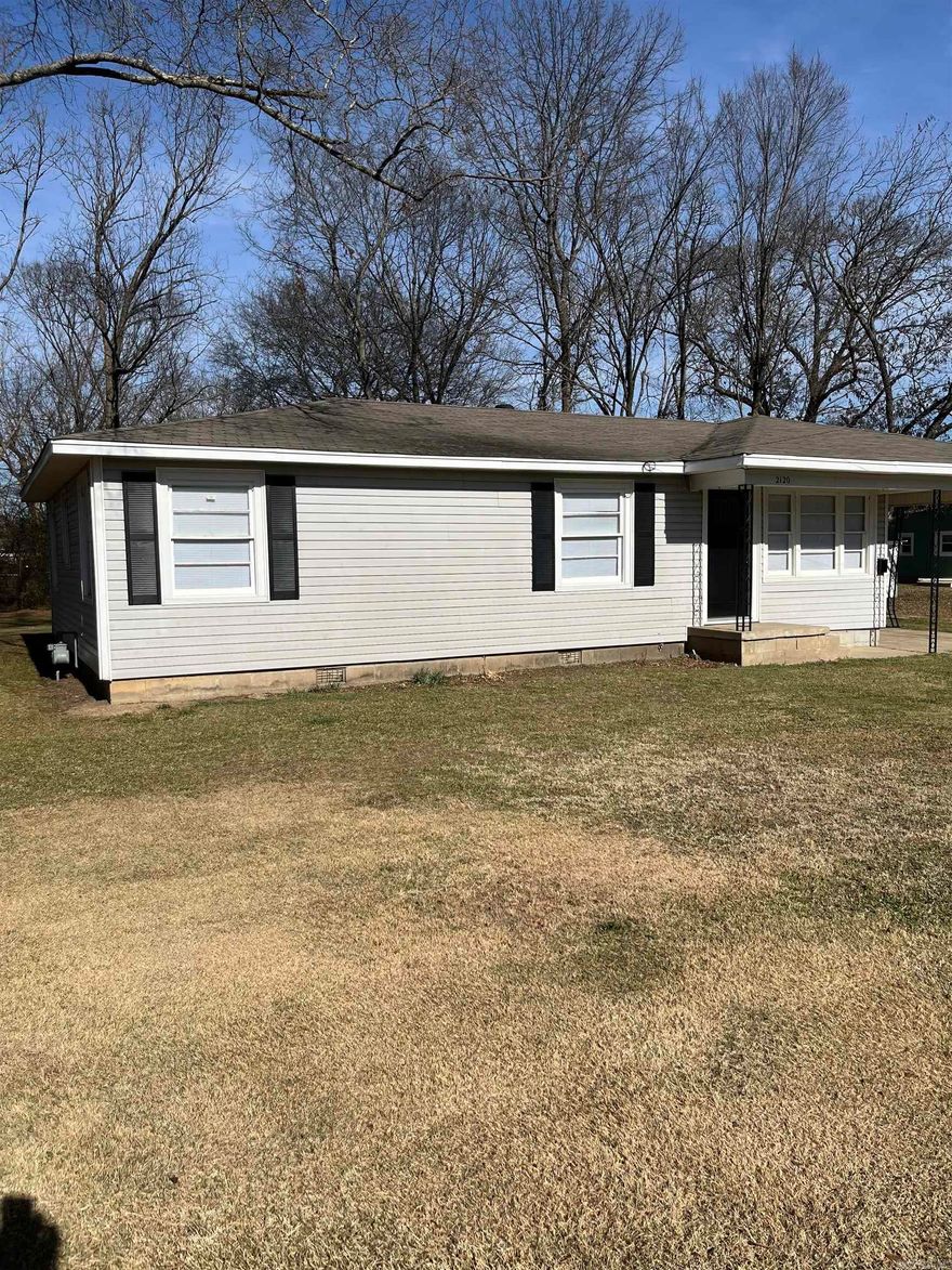 Ready for new homeowner or investor. All freshly painted with new flooring thru out.  Many updates include plumbing, blinds, outlets lighting and other.  Four (4) bedrooms or three and  one for office! Laundry off Carport great location to colleges, schools and shopping. Agents see remarks . Combo code lock box on front door .