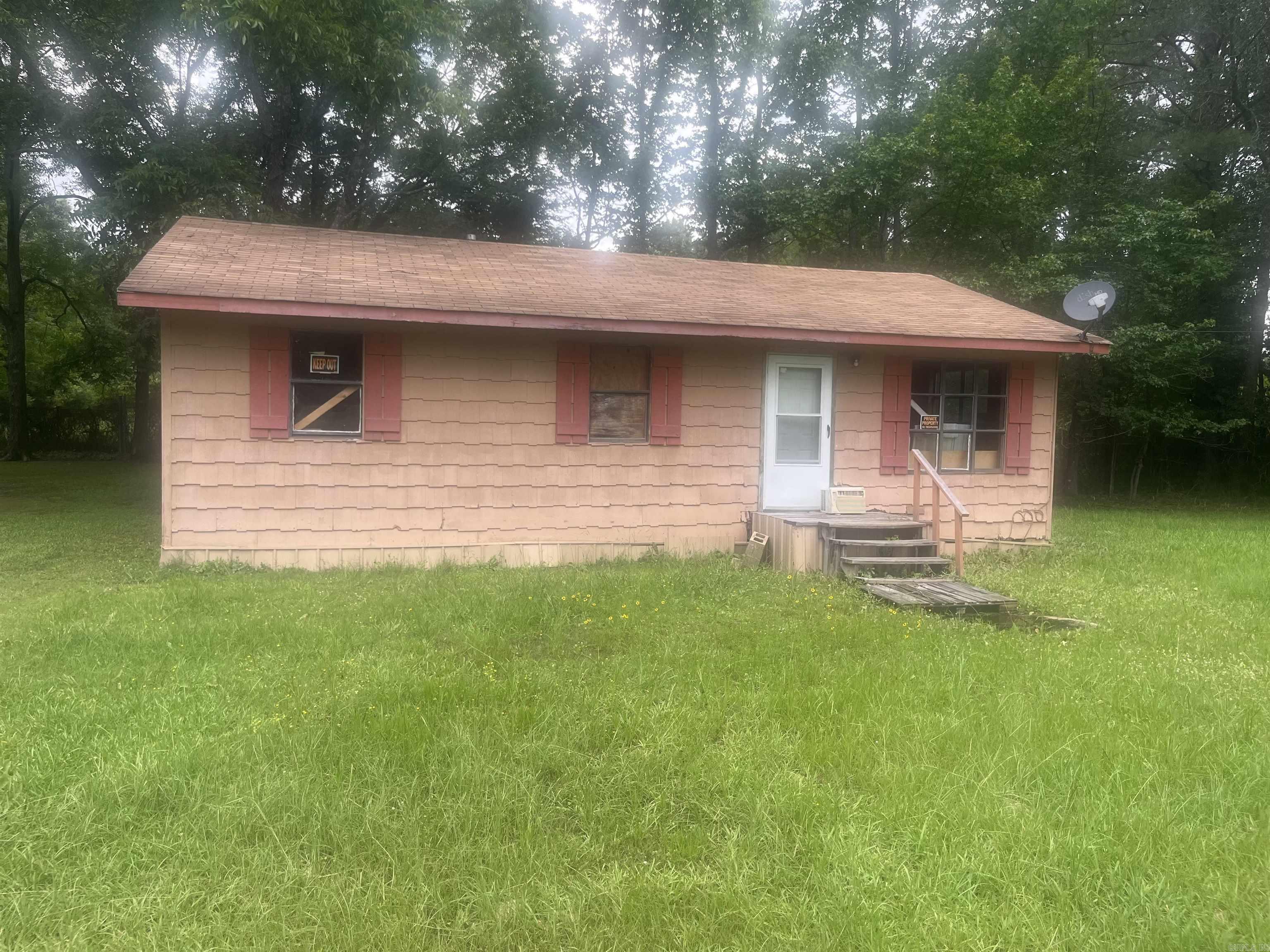 SOLD AS A PACKAGE DEAL ALSO A 2 BEDROOM 1 BATH HOME INCLUDED 618 JENKINS DRIVE AND 0000 GARDNER TOTAL OF 2.2 ACRES OF LAND INCLUDED. INVESTORS SPECIAL GREAT FOR SPACE TO BUILD OR ADD MOBILE HOMES AS WELL. BRING ALL OFFERS!!!!!