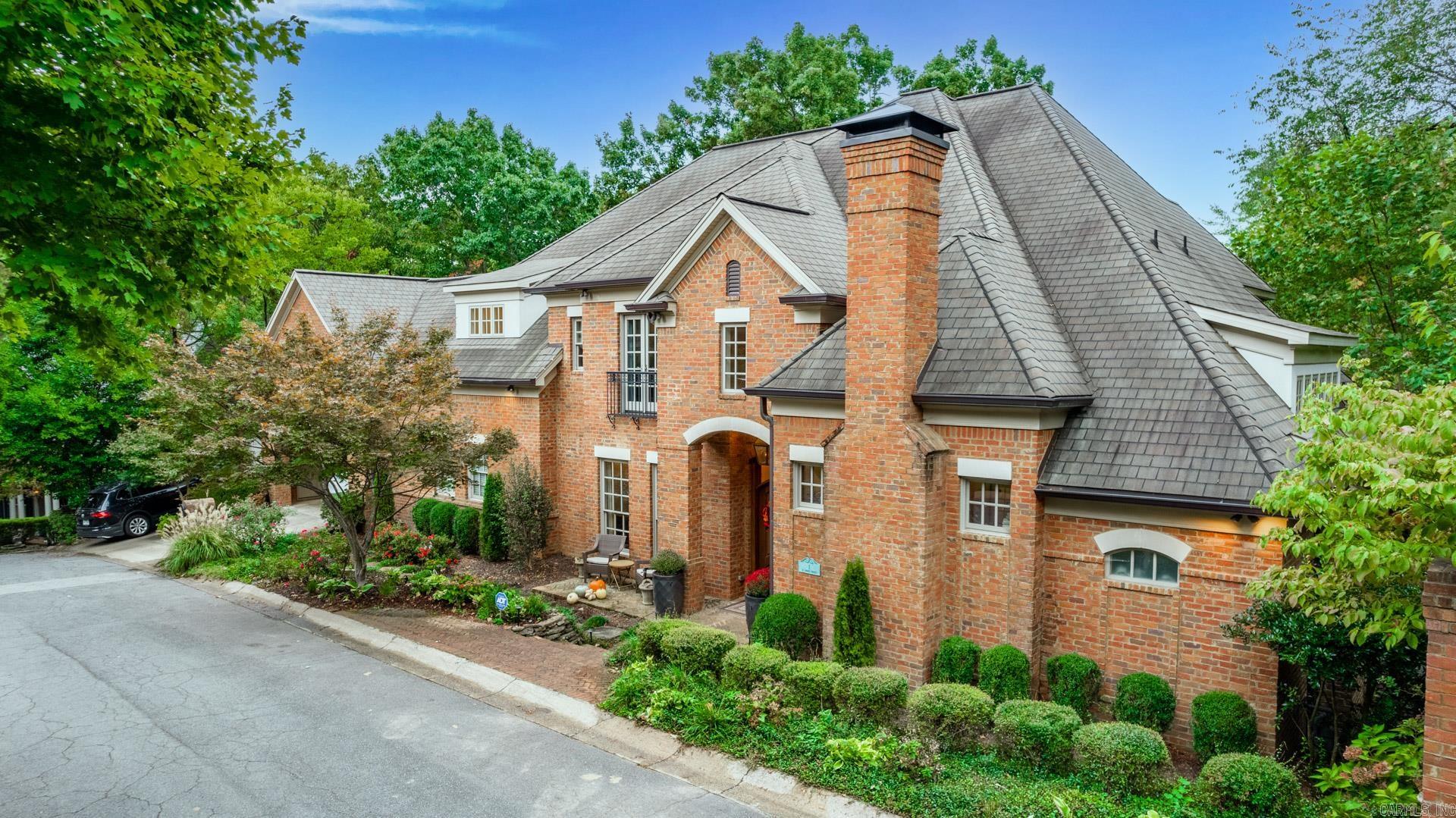 Abundant light in this wonderful, custom Heights home built just 12 years ago. Main level living includes large master w/ his & her vanities & closets w/ heated floors. Large great room w/ wall of windows overlooking wooded vista. Amazing outdoor space!! Stainless appliances galore in large kitchen open to the great room & breakfast space. Cozy study/den right off the master, perfect for evening time. Formal dining w/ butlers pantry. 3 large, en-suite bedrooms upstairs. 1000k ft of heat & cooled bonus below