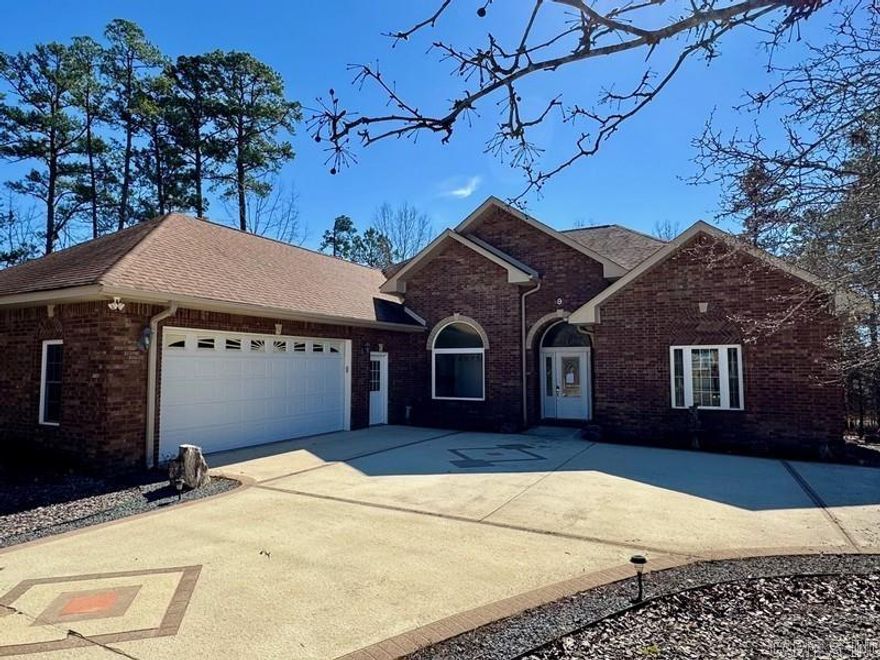 Beautiful one level traditional style home nestled on a private corner lot located within the gated community of Hot Springs Village and within walking distance to the 16th hole of the Coronado Golf Course. Home features 3 bedrooms, 2 full baths, 1 partial bath, great room, fireplace, formal dining, kitchen with breakfast nook,  AirVac Gold Series central vacuum system, attached 2 car garage, porch, front circle drive, open foyer with arches, columns and vaulted ceilings.  HUD Case #031-494082, FHA Financing: IN (Insured). Property is sold in as-is condition, no warranties, guarantees or representations.