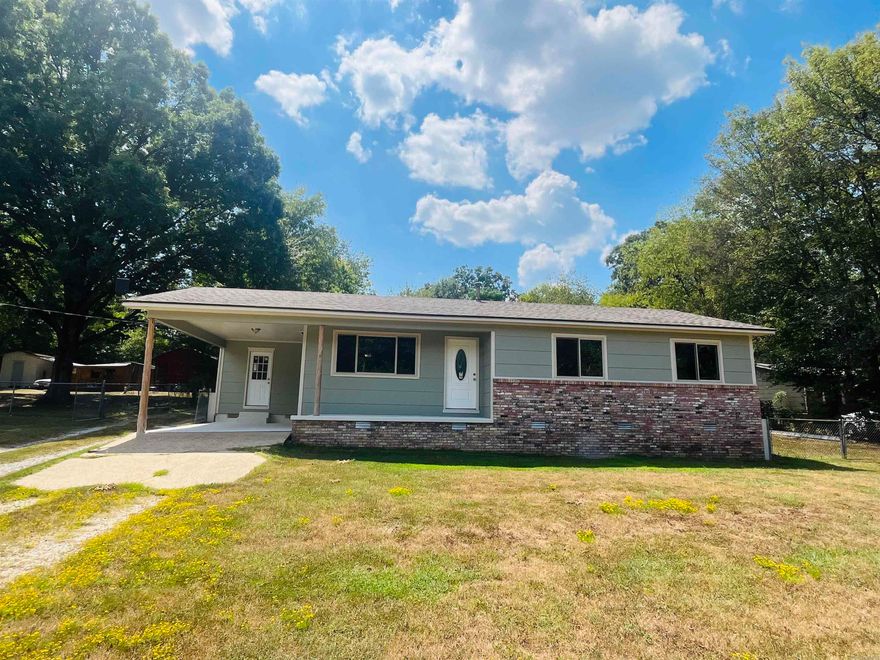 Attractive 3 bedroom 2 bath home with many recent updates and improvements.  This home features hardwood floors, tiled bathroom, all new vinyl windows, dishwasher, gas cook stove, cabinets, and countertop. A covered deck out back, attached covered parking and a 5 bay shop are great amenities to this place that could be the perfect fit for your needs.