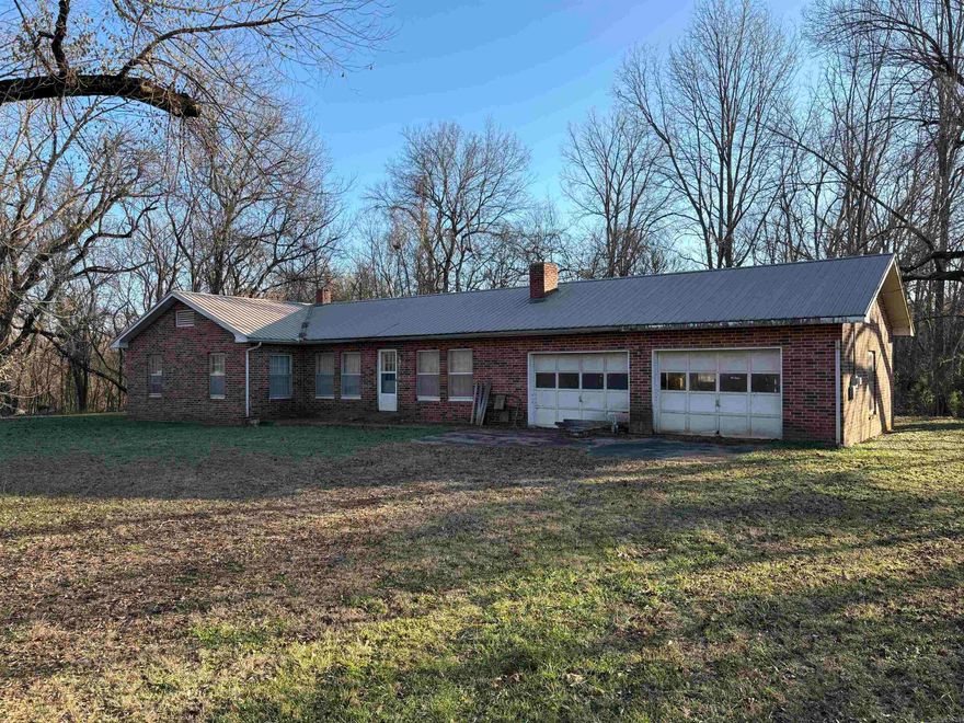 Discover the potential in this fixer upper sitting on a spacious 1-acre lot in the quiet community of Pyatt, just a stone's throw from the clear waters of Crooked Creek-famous for its excellent smallmouth bass fishing and natural Ozark beauty. This property offers a solid start for anyone looking to renovate, flip, or create a personalized retreat. The home features original hardwood floors, underground cellar/storm shelter, multiple living areas, a functional layout, and plenty of room to reimagine the space to your liking. With mature trees, a level yard, and room for additions or outbuildings, the exterior is just as promising as the interior. Whether you're an investor or a DIY enthusiast, this property is a rare opportunity to own land close to one of the area's most beloved natural attractions. Bring your vision and make this Ozark fixer-upper shine!