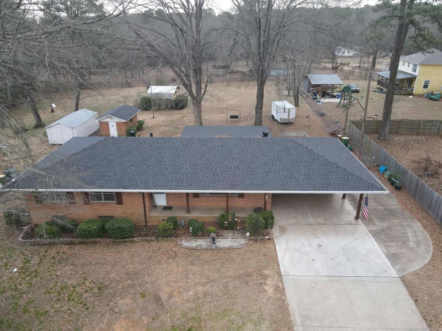 If you are ready for comfort, you have found home! Besides 3 bedrooms and 2 full baths, you'll have a living room, den/dining room, a sun room and a walk-out basement! The Living Room has new carpet and is spacious with a wonderful view for watching birds or the world go by! The den/dining room could suit many purposes, gathering for family meals, gametime or other social activities! The Sun room is where I'd go to kick back, relax and perhaps sip a favorite drink! The basement is a perfect get away place also, and would make a perfect person-cave, a place to work on hobbies, or a game room! The roof is a couple years old and the furnace is less than 5! The home has a total of 2,848 sf that is heated and cooled of which 2,073 is upstairs and the basement has 775 sf! The Primary Bedroom shower is new and has a Lifetime Warranty. The basement has had outstanding work done to prevent moisture problems! Huge fenced in back yard with a patio area, storage building and carport cover! All this just minutes to I-30! Agents please read Agent Remarks!