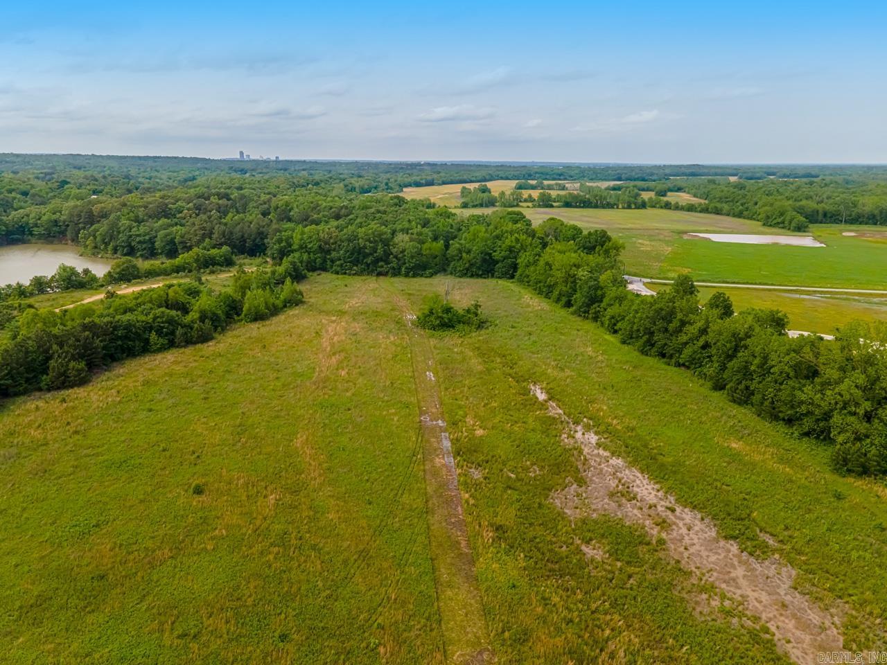 With over 50 acres at your disposal, the potential for development is limited only by your imagination. Dream of building your own private estate, complete with a luxury residence, guest cottages, and recreational amenities. Or envision a sustainable eco-community, where like-minded individuals can coexist in harmony with the land. Entrepreneurs may see the perfect location for a wellness retreat, organic farm, or outdoor adventure center. Whatever your vision, this property provides a blank canvas upon which to bring it to life.Whether you're seeking a weekend getaway, a permanent residence, or a lucrative investment opportunity, this property's prime location ensures that all your needs are within reach. Opportunities like this are rare indeed - seize the chance to own over 50 acres of unspoiled beauty and endless potential. Whether you're an outdoor enthusiast, an aspiring developer, or an astute investor, this property offers something for everyone. Don't miss out on your chance to make your dreams a reality - inquire today and start your journey to paradise!