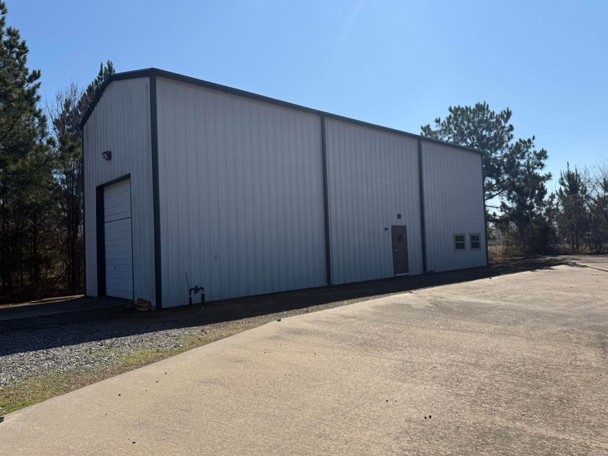 This is an awesome opportunity. Priced to sell. This is currently zoned C-2, seller has recently started finishing out for an office, bathroom, and nice meeting space. This would make a great storage warehouse plus office area.  Nice size overhead door as well. Lots of possibilities. All on just over an acre in the City of Conway.
