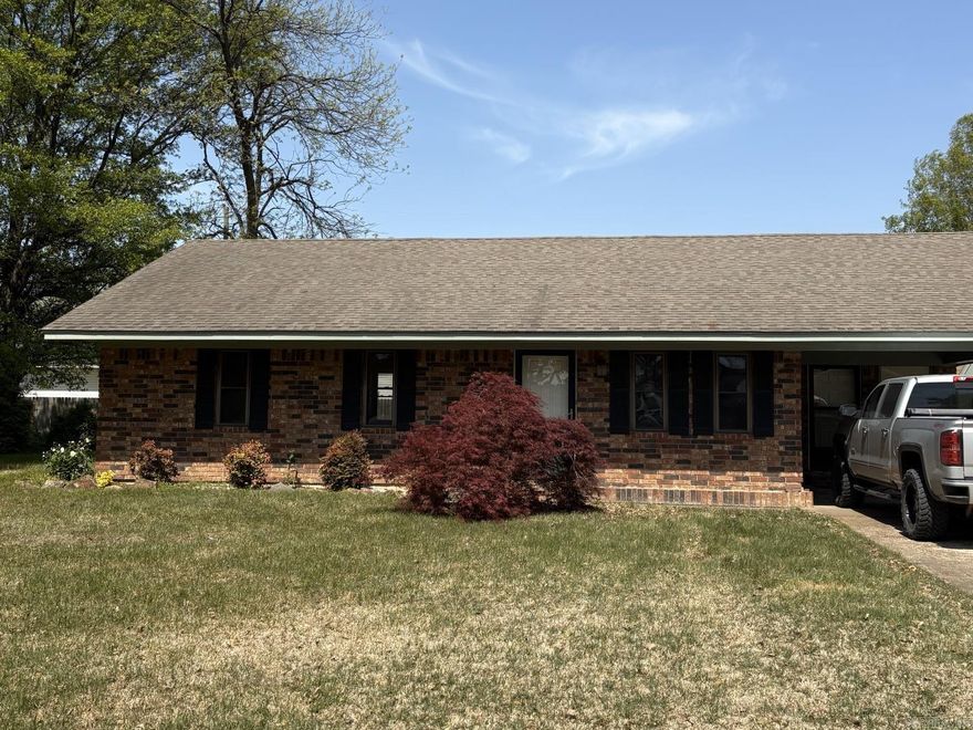 Refreshed 3/2 with LVP, living room, eat-in kitchen outfitted with refrigerator, electric range & dishwasher and separate laundry room. All electric with brick exterior & 1-car carport.