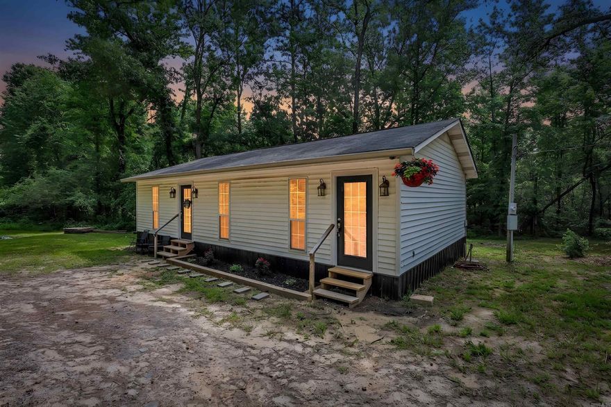 Tucked away on approximately 2.33 acres in the Kirby School District, this recently updated home offers the perfect blend of comfort, charm, and country living. This very cute 2-bedroom, 1.5-bath home features approximately 1,040± square feet with thoughtful improvements throughout.  Inside, you’ll find all new kitchen cabinets along with updated flooring in the kitchen, living room, and additional bedroom. The primary bathroom has been completely remodeled with a new tub/shower combination, vanity, and walk-in closet, creating a fresh and inviting retreat. Additional updates include a new tankless water heater along with all new septic and water lines installed by the current owners.   The spacious lot offers room to be outdoors, located in Kirby less than 5 minutes from Lake Greeson, near the Caddo River and within 1 hour of Lake Ouachita and Lake Hamilton. Whether you’re searching for a starter home, downsizing, or looking for a move-in ready property with a a couple of acres, this one is full of potential and charm.