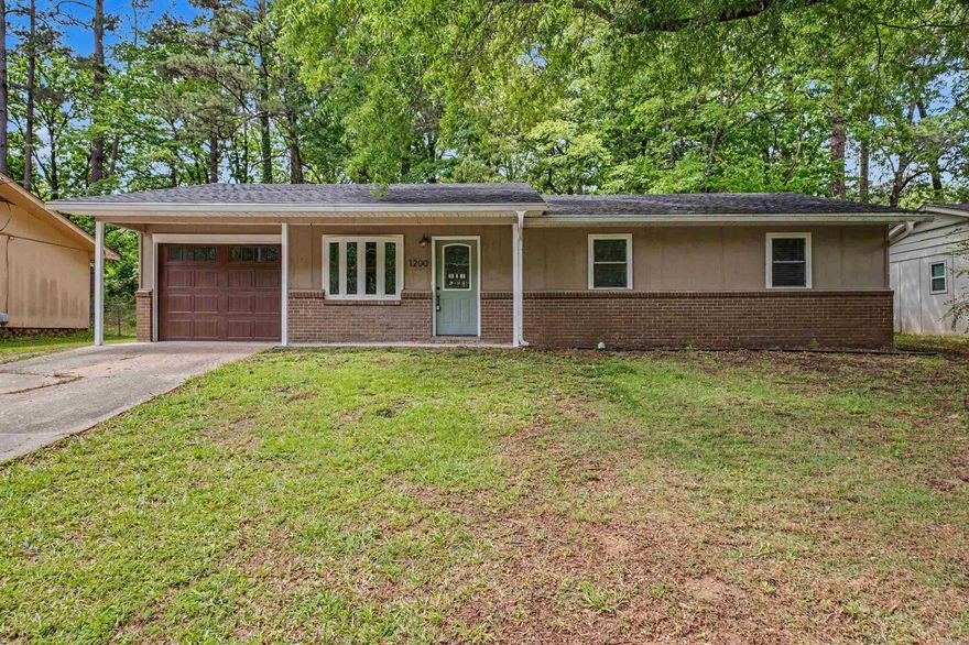 Priced under $200K and nestled just minutes from Lake Pauline in Benton, this beautifully updated 3-bedroom, 1.5-bath home is truly move-in ready. Featuring a brand-new roof, durable LVP flooring throughout, and stylishly renovated bathrooms, this home offers the perfect blend of modern updates and everyday comfort.  The partially open floor plan creates a seamless flow between the living, dining, and kitchen areas—ideal for entertaining or simply enjoying the space. Natural light fills the generous bedrooms, each offering ample closet space.  Step outside to a large backyard perfect for gatherings, along with a spacious storage building that conveys with the property—ideal for tools, hobbies, or extra storage.  Whether you’re a first-time buyer or looking for low-maintenance living in a quiet setting, this home checks all the boxes.