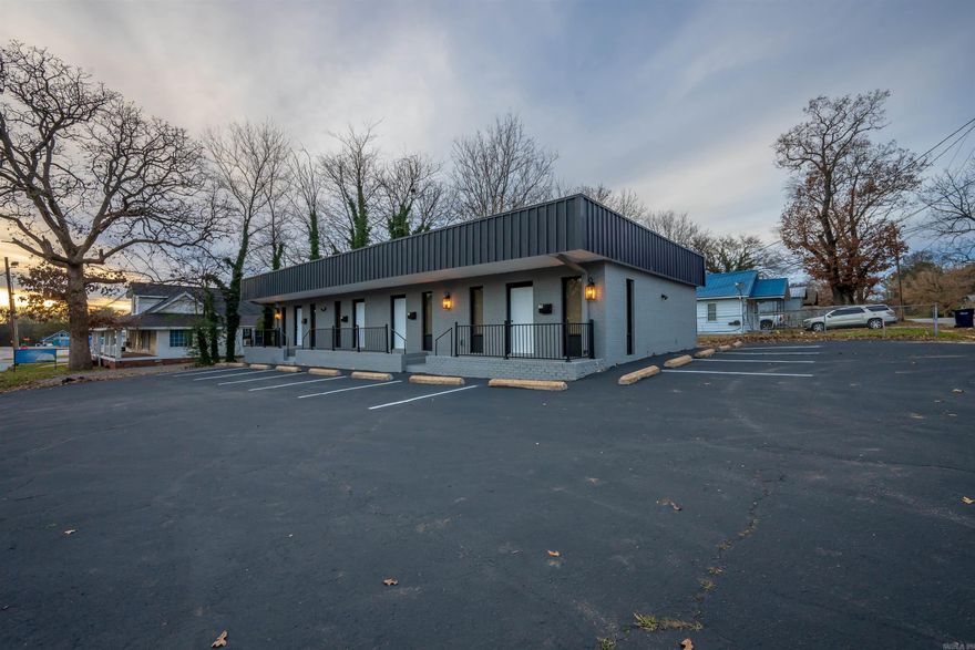 PRIME turn-key investment opportunity with 100% occupancy! This brick quadplex has been completely remodeled to the studs and converted into four 1 bed / 1 bath apartments, located just one block from Main Street—a high-demand rental location. Each unit is approx. 495 sq ft with separate utility meters. Major upgrades include all-new plumbing (2025), brand-new electrical wiring with upgraded 220 electrical boxes in each unit (2025), and new interior ductwork (2025). Each unit features new sheetrock, new LVP flooring, new interior & exterior paint, new backsplash, and new electric water heaters. All units include brand-new appliances: refrigerator, stove, microwave, and Samsung washer & dryer. Parking lot resealed and striped (2025), roof recoated in 2023 per previous seller, new black metal railings, plus  ample and overflow parking. Ideal for cash flow and long-term appreciation. Schedule a private showing today and secure this exceptional income-producing asset. Agent owned.