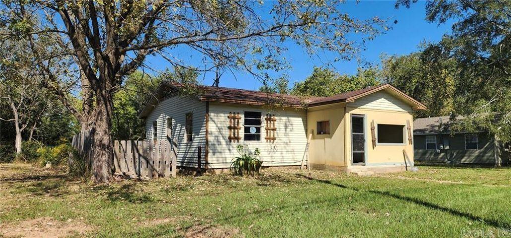 Looking for your next investment? Look no further then this. Right on scenic hwy 7 in down town Dover. This fixer upper can make for a great investment opportunity. With some many amenities close by and still have the small town feel. You do not want to miss out on this property!