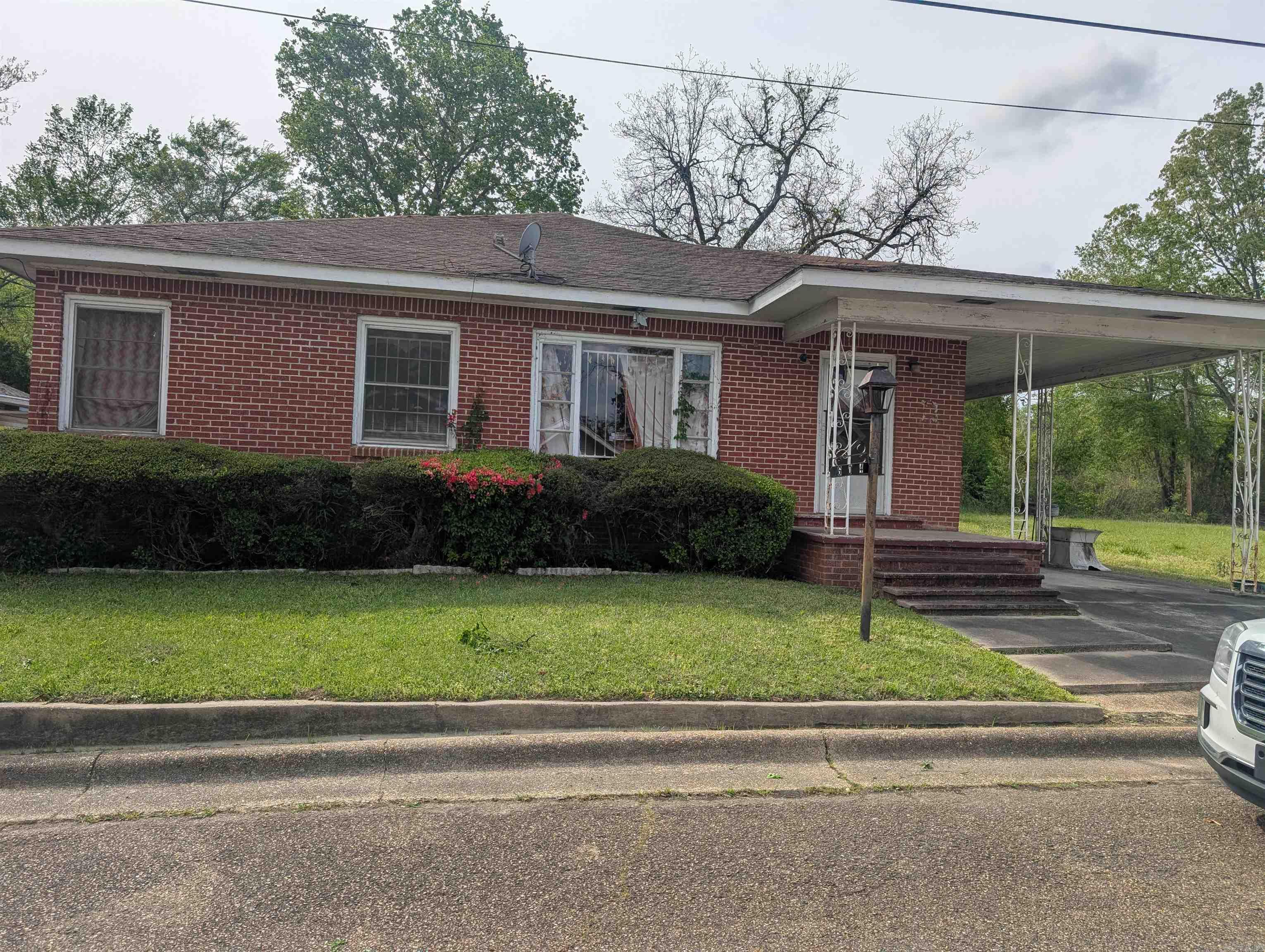 Investors check out this classic 4 bedroom, 2 bath home in the center of the city. This home needs lots of TLC to bring it back to its former glory and charm. The home has a spacious primary bedroom, huge family room with a bar, courtyard patio and wrought iron window and patio cover. Must see to appreciate.