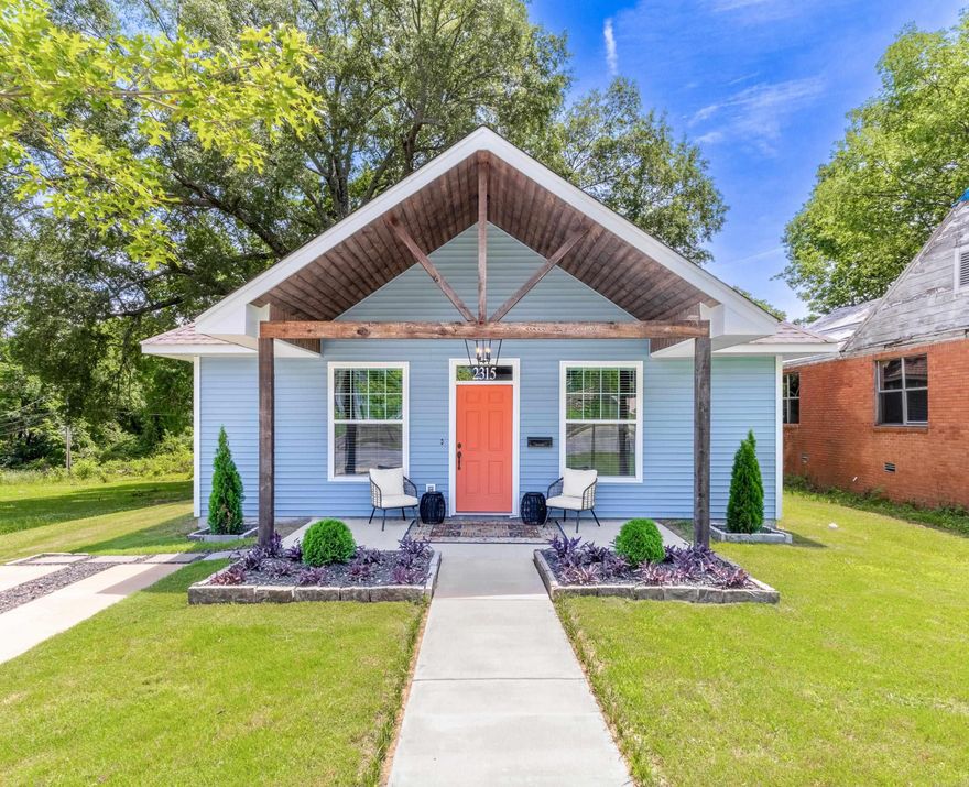 Welcome to your nearly new 2-year-old Pettaway Pad! This charming 2 bed, 2 bath residence offers modern comfort and convenience. This charming home offers an open floor plan kitchen, dining and living area. Enjoy the cozy ambiance of the new electric fireplace in the living room, enhanced by stylish custom accent walls. The hallway to the rest of the house has custom wood beams that perfectly blend into the space. The guest bathroom, featuring a dark wooden accent wall boasts an oversize soaker tub. Walk into the primary bedroom and you’ll see the spacious closet with dual doors, one leading to the laundry room for easy access. The ensuite primary bath boasts a luxurious walk-in shower.  Step outside to a large, flat, fully fenced yard, perfect for relaxation and outdoor activities. Don't miss out on this meticulously maintained gem! Agents See Remarks