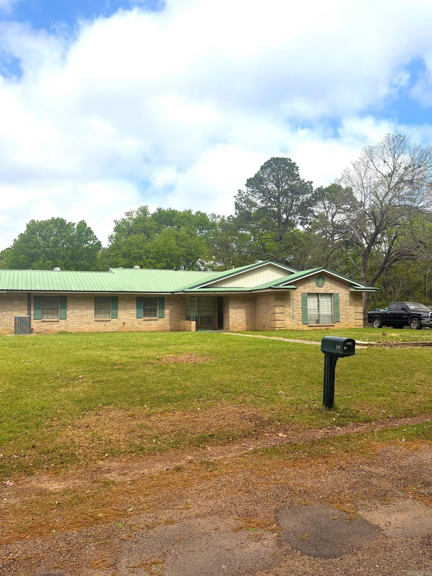 Spacious and versatile home in Texarkana! This 4-bedroom, 3 full bath property includes a separate mother-in-law suite with its own private entrance (French doors), wet bar, and stove perfect for guests, extended family, or rental potential.  The home features two HVAC units one approximately 9 years old serving the suite, and another 10+ years old in good condition for the main home. Enjoy outdoor living with a concrete driveway, deck, and a fully fenced backyard, plus an 8x15 storage shed for added convenience.  A great opportunity for multi-generational living or added income potential!