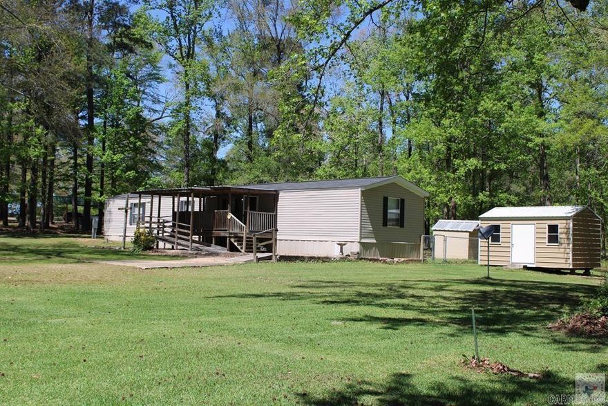 Well maintained and ready for occupancy. Genoa school district. 1.29 acres. 3 bedrooms, 2 baths. Two storage buildings. Fence off the back deck for dogs or play area for small children.