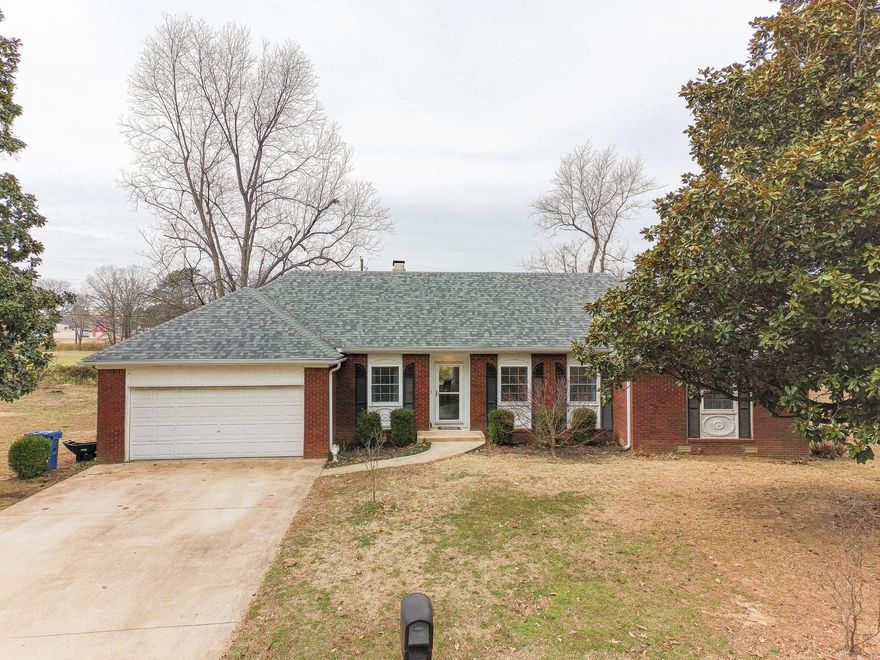Beautifully maintained 3 bedroom, 2 bath all-brick ranch style home tucked away on a quiet cul-de-sac in a highly desirable location. The open-concept kitchen features a breakfast bar and eat in kitchen area with a gas fireplace and wonderful views of the backyard. The formal dining room also provides the perfect space for hosting. This property is thoughtfully designed with excellent storage throughout and a separate laundry room for added convenience. Numerous upgrades reflect the care and pride of ownership in this home. Enjoy the wonderful lot with scenic views overlooking the Arkansas State University farm and nearby farmers market. Ideally located just minutes from Arkansas State University, NEA Baptist Memorial Hospital, and St. Bernard's Medical Center, this home offers comfort, convenience, and an unbeatable location.