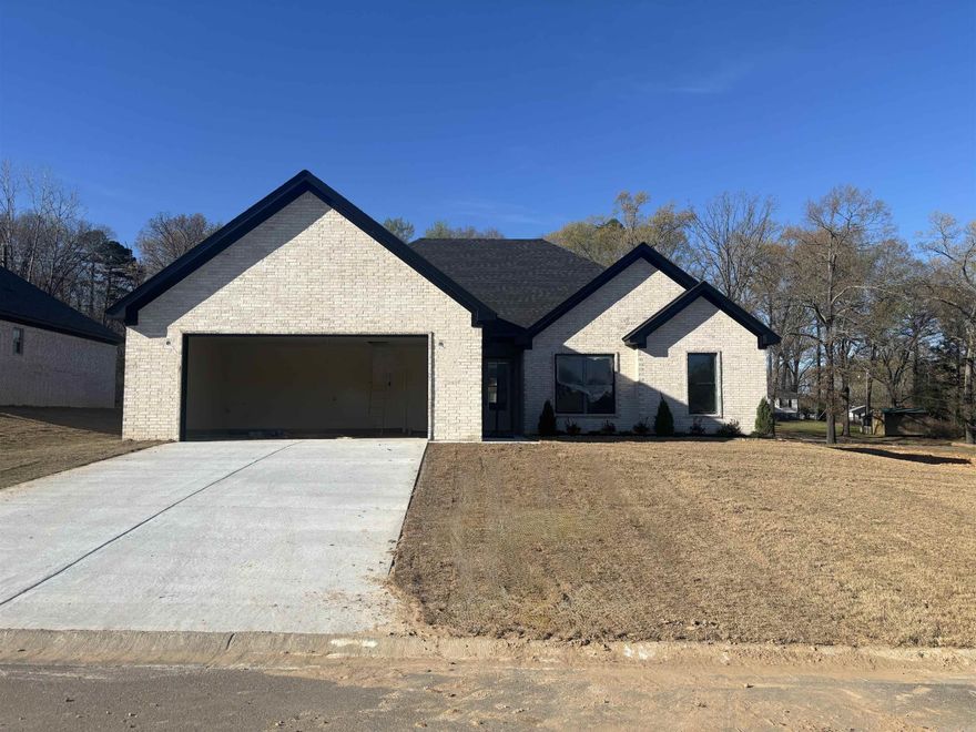 This home is close to schools and downtown Benton. Has LVP flooring, granite countertops, large walk in pantry, island over looking great room. Primary has custom tile shower and free standing tub. has 1/2 bath off of kitchen. Other bedrooms are large with over sized closets. Home comes with privacy fence.        lvp flooring
