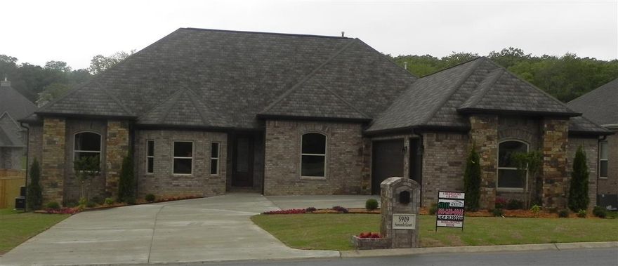 This custom beauty's curb appeal comes without a large lawn care burden!  For the buyer seeking luxury living & energy efficiency galore! Beautiful granites, hardwoods, top of the line appliances, custom designed mill work, not 1 but 2 whirlpool tubs, 4 full bathrooms and bedrooms. Your clients will fall in love with the kitchen features and be impressed with the spacious walk-in pantry.  Large upstairs room with full bathroom may serve as 5th bedroom for guest, media room or game room.