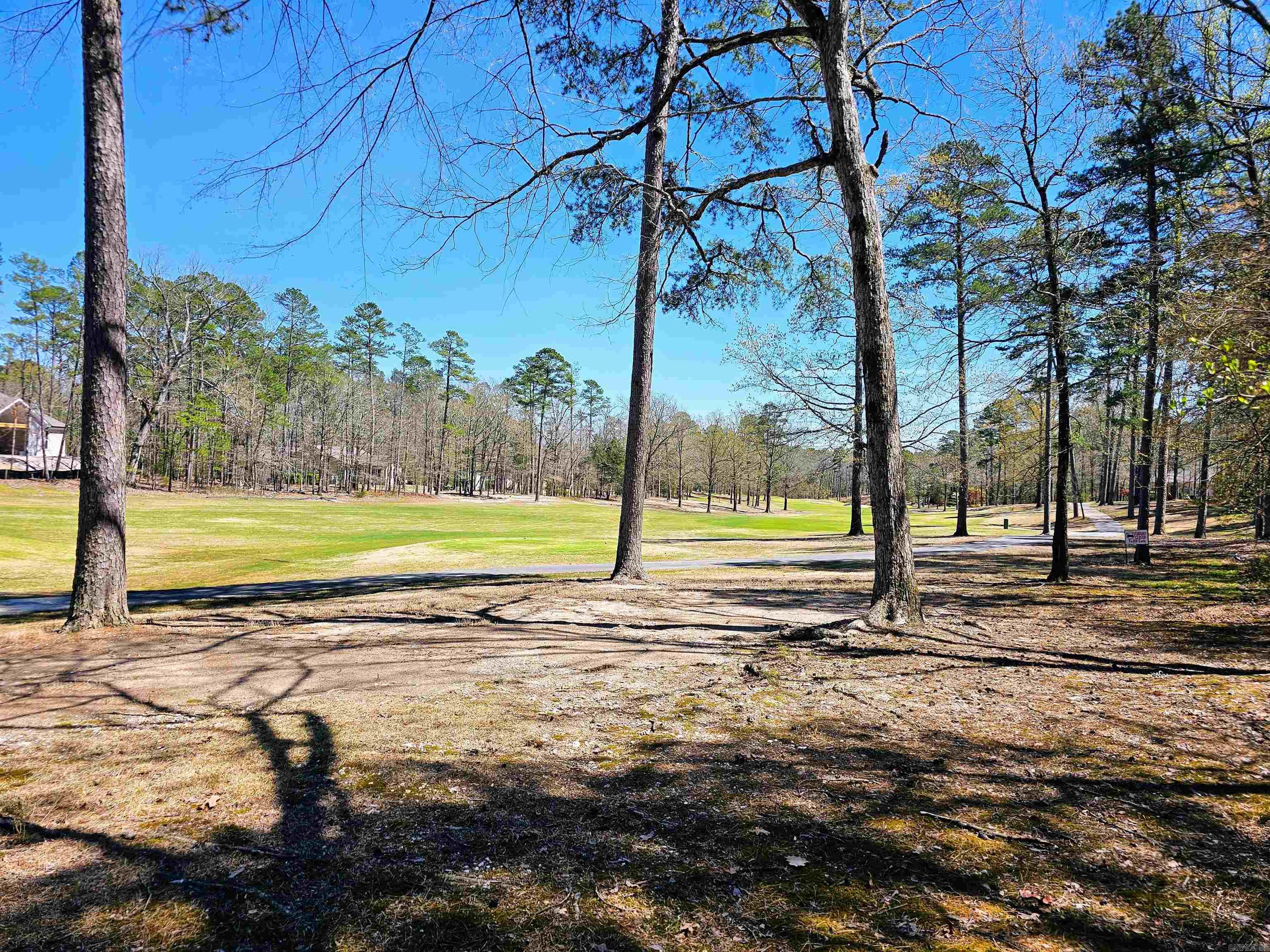 East End golf course lot located on the 1st hole of Ponce Golf Course. Hot Springs Village is a gated community with 9 golf courses; 12 lakes; 30+ miles of walking trails; state of the art fitness center; tennis complex; indoor/outdoor pickbleball courts; and outdoor pool. Come see all that the Village has to offer! Photos 5-17 are photos around Hot Springs Village. First time buyers to Hot Springs Village are subject to a one time Buy In Fee of $300.00 payable to HSV POA payable at Closing. When lot is developed, an additional fee of $1,700.00 will be collected. Agents See Remarks