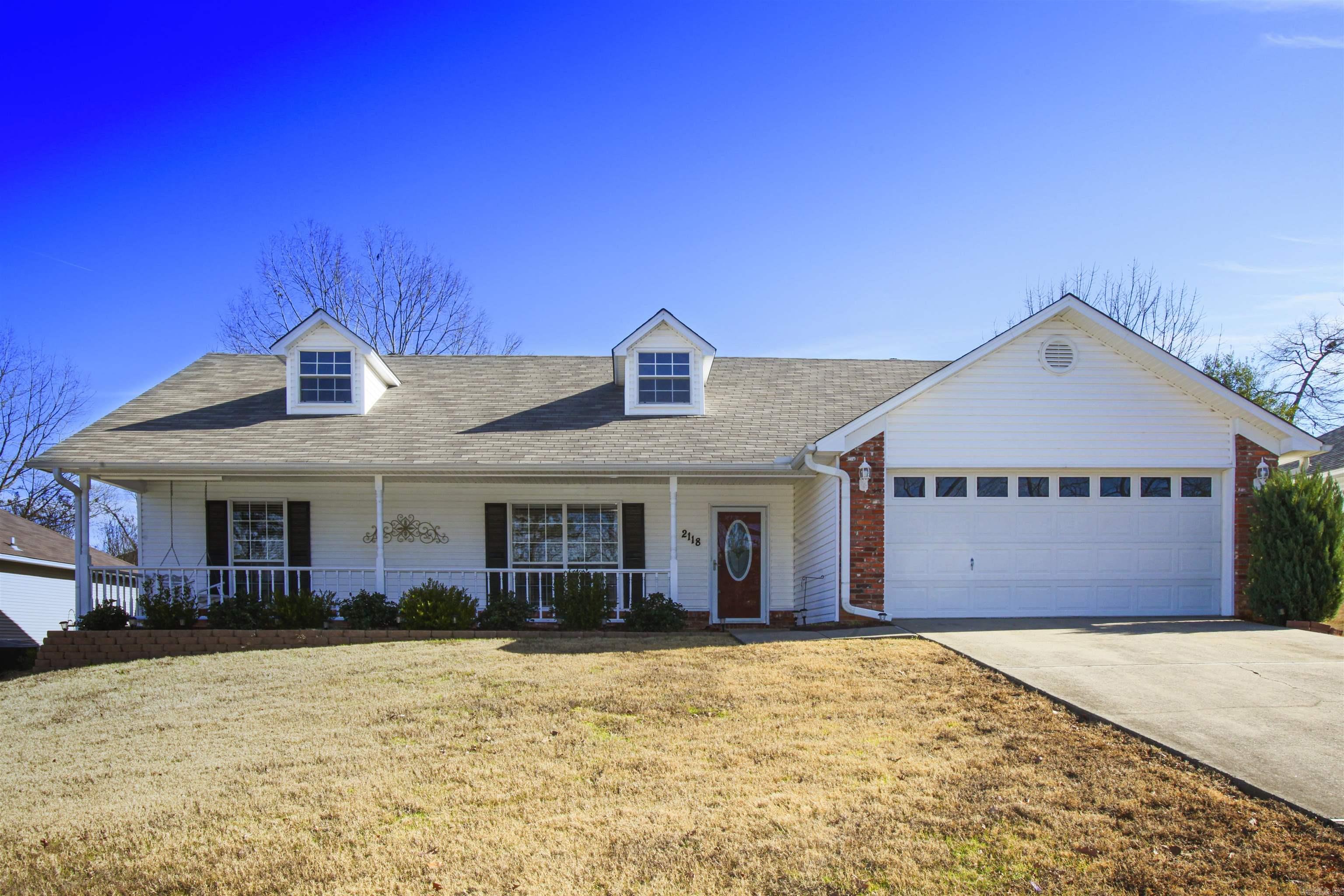 Check out this beautiful family home has tall pan ceilings in the great room with a cozy gas fireplace. The large kitchen has lots of cabinet space, a breakfast bar, and newer appliances. All of the bedrooms are large and have nice closet space. The dining room is perfect for large family gatherings and leads to the patio in a privacy fenced back yard. There is a shop with electricity and air conditioning along with a lean-to. This place also has a is a large covered front porch and nice landscaping.