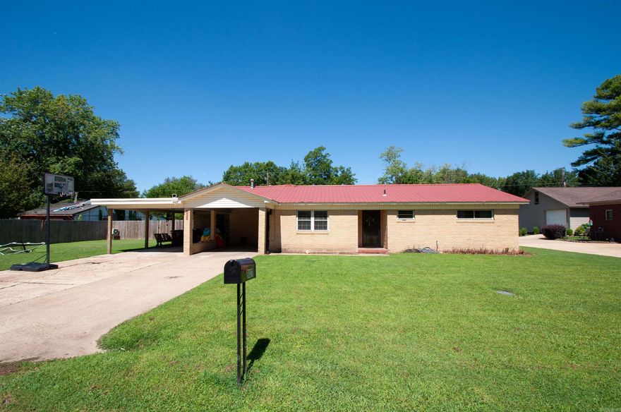 Discerning homebuyers will appreciate the quality and style that defines this beautifully remodeled four-bedroom ranch-style residence, located in a prime established neighborhood. The home features resilient vinyl flooring, generous fenced back yard,  a metal roof, and a recently upgraded HVAC system for optimal climate control. Two large bathrooms complete this exceptional offering.