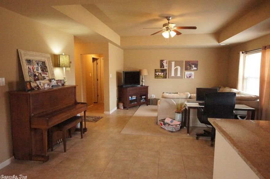 Awesome home in Bryant School District. Rural feel but still close to town. Split floor plan, huge open living room with trey ceiling, gorgeous tile floors in common area. Open kitchen with breakfast bar and granite countertops. 2 car side loading garage on a corner lot. Large fully fenced back yard, great for children or pets. Quiet well kept neighborhood....Qualifies for 100% financing Rural Development loan!