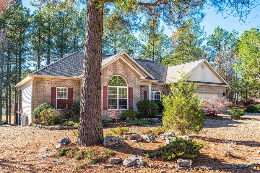 The perfect blend of comfort, functionality, and natural beauty, it's not just a house; it's a haven. First off, this location is a winner! The fact that it's a one-level living setup with an open floor plan adds to the appeal. Upon entering you will immediately notice the bank of welcoming windows that flood the living space with natural light, offering a stunning view of Granada Golf Course. Imagine waking up to that every day – talk about a great way to start your mornings! And to top it off, you get seasonal lake views of Estrella. That's a touch of nature's beauty right at your doorstep.  Feel the warmth and coziness of the main living area, especially with the gas fireplace. Perfect for those chilly evenings. The well-appointed kitchen with newer appliances and plenty of counter space sounds like a dream for anyone who enjoys cooking or hosting friends and family.  Breakfast with a view overlooking the 2nd Tee Box adds a charm.  The large primary bedroom with an expansive walk-in closet and a private deck entrance – that's a retreat within your own home. With convenient East Gate access from DeSoto Blvd, you're in a prime location!  Call for your showing today!