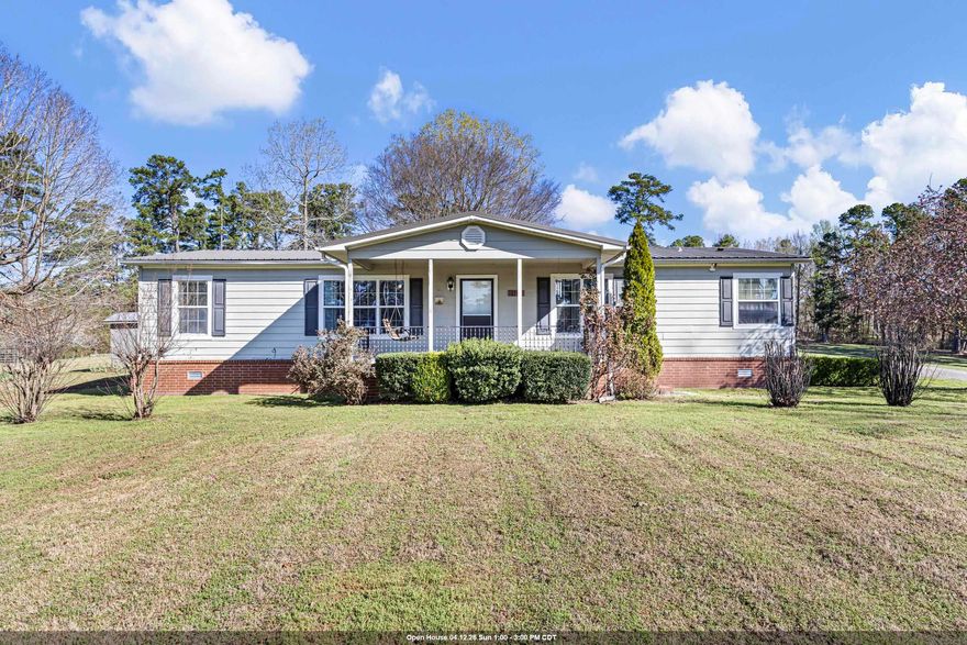 Discover the perfect blend of privacy, land, and convenience with this home on 27 beautiful acres featuring a stocked pond ready for fishing. This nearly 1,800 sq ft home offers a comfortable layout with a spacious living area and a kitchen complete with granite countertops, ideal for everyday living and entertaining. Large windows invite natural light and provide peaceful views of the water and surrounding acreage. Step outside to enjoy endless possibilities—room for a garden, hobby farm, recreation, or simply relaxing in your own private setting. The land offers a mix of open space and natural beauty, making it ideal for those seeking a quieter lifestyle with space to grow. Located just 10 minutes from shopping, restaurants, and healthcare, this property delivers the best of both worlds—country living with easy access to town.