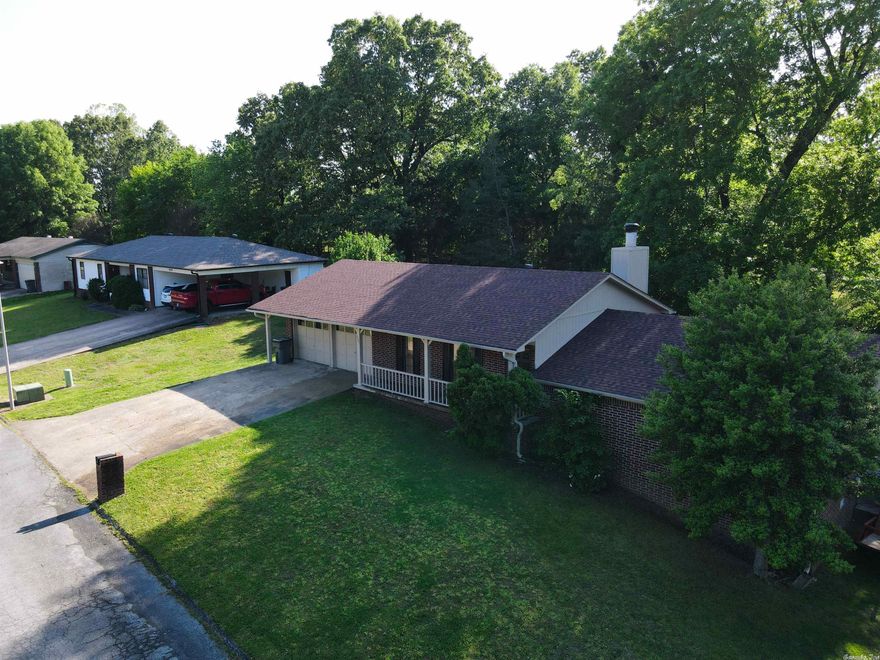Super nice home at the end of a quiet street. Completely updated in 2022- New HVAC, roof, gutters, LVP flooring throughout, window treatments, kitchen & bathroom countertops, fans & light fixtures. Enjoy the backyard shade from the large deck!