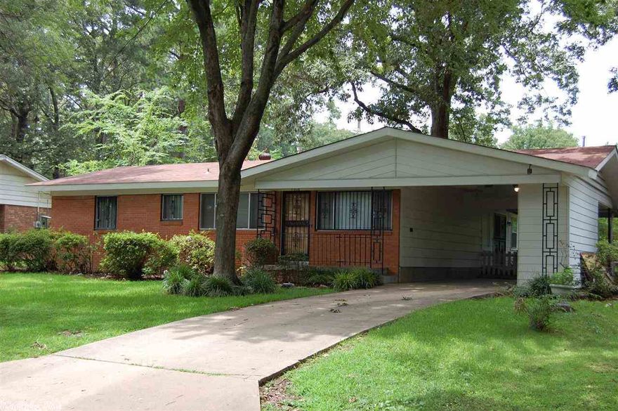 Great home in the heart of Little Rock!! Well maintained 3 bedroom, 1 1/2 bath home with hardwood floors. Large living/dining combination. Family/den room with gas fireplace and new carpet. Covered carport and patio area perfect for entertaining. Outside storage room off the carport. New roof in 2012 and hall bath updated in 2011. Large backyard perfect for gardening.