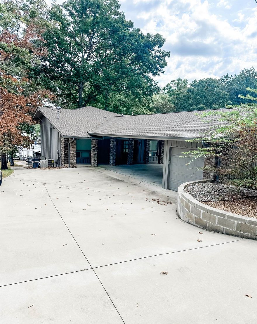 Stunning Newly Remodeled Lakefront Home on Lake Thunderbird! This beautiful 3-bedroom, 2-bathroom home offers breathtaking views and direct access to the water with a 2-slip boat dock. Enjoy modern updates throughout, including a spacious open-concept living area, sleek kitchen, and plenty of storage space. The large deck and private backyard are perfect for outdoor entertaining or simply relaxing by the lake. Plus, the pictured boat is included with the property, making it even easier to start enjoying the water right away. Located in a peaceful, sought-after neighborhood, this home is an ideal retreat for boating enthusiasts. Don’t miss out on this rare opportunity!