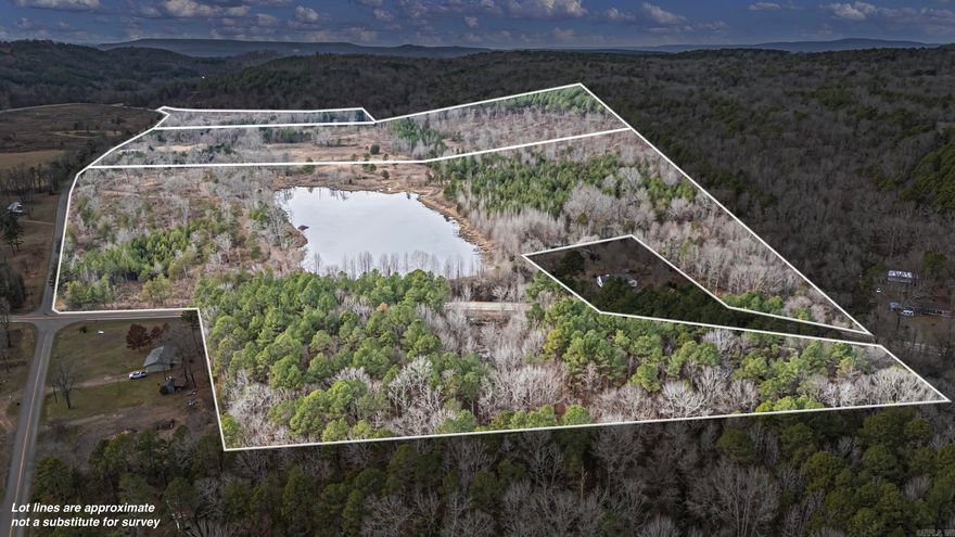 Check this tract out! Right at the intersection of SR 7 N & Booger Hollow Rd.  40 + acres North of Dover close to the Ozark National Forest? Check!  5 +/- acre Lake? Check!  Access to Public Water, Electricity & Fiber Internet?  Check!  This 40 + acre property might just have everything you've been looking for. With the pond (small lake) & endless hunting / outdoor activities on site, you may never want to leave. However, if you still need room to roam, this property is less than 15 minutes from the Ozark National Forest, Piney Creek, Mack's Pines, Long Pool Swimming Area, & downtown Dover, AR.