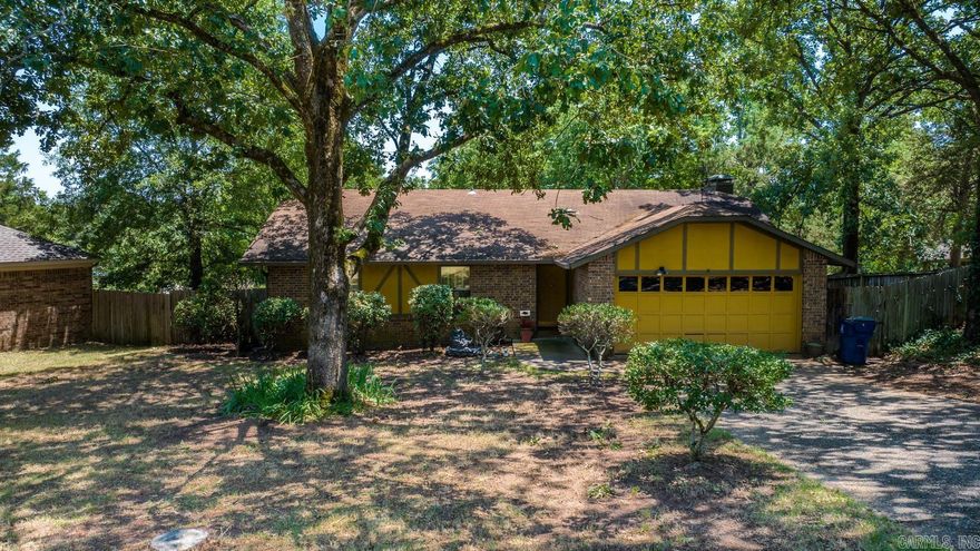 Charming Tudor style ranch on quiet cul-de-sac with beautiful mature oak trees.  Vintage mid-century style from the moment you step onto the tiled entry area.  Separate entry, large family room with fireplace open to dining with access to deck and back yard. Open flow through galley style kitchen with vintage Jenn Air built-in stove. Guest bedrooms are spacious with tons of vintage charm & built-ins. Main suite is colorful and spacious with full bath & walk in closet. Light fixtures are a mix of new and vintage. HVAC, gutters and microwave new in 2018. This is a one-of-a-kind, definitely not cookie cutter!